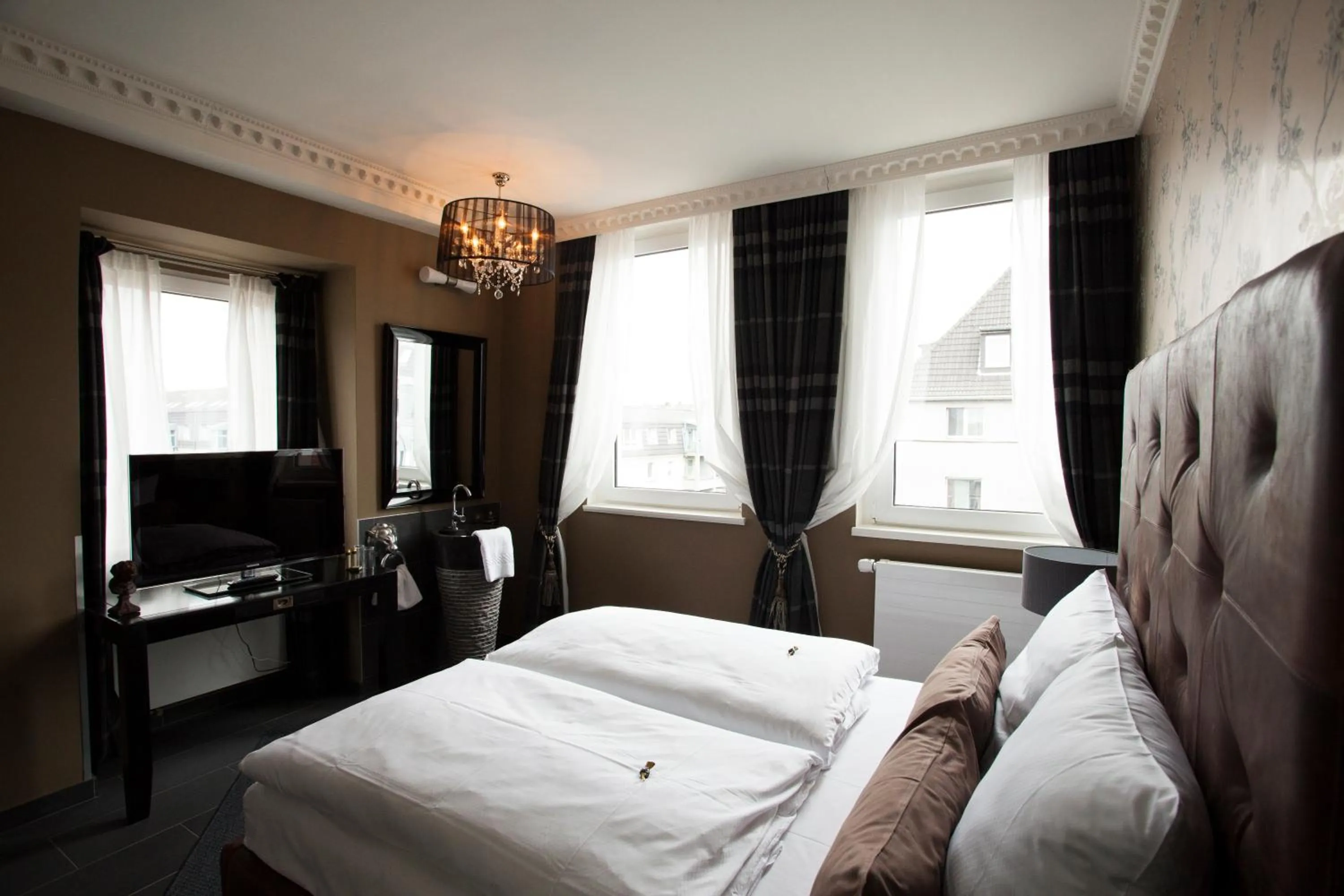 Photo of the whole room, Bed in Boutique-Hotel GEORGES