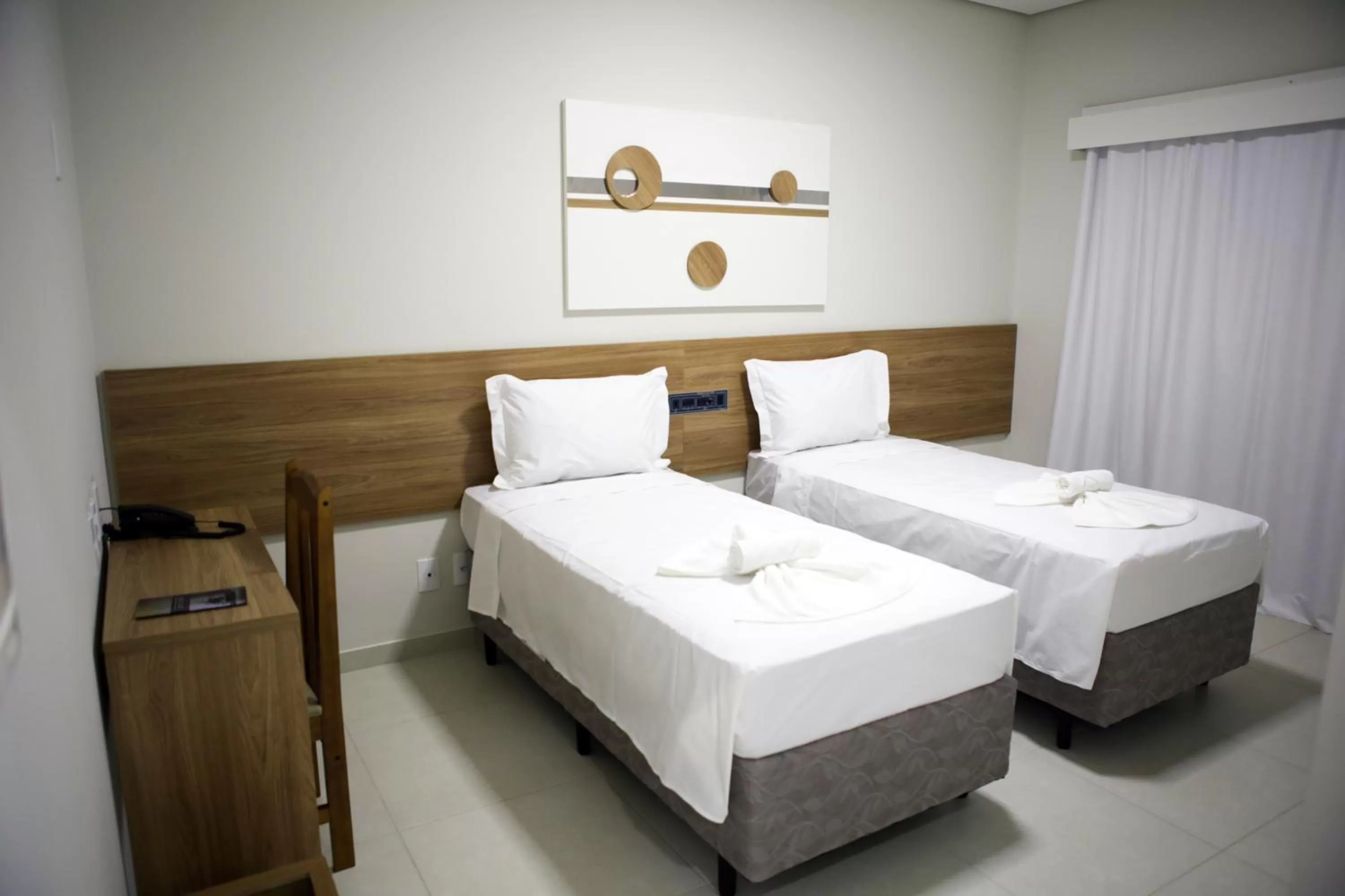 Bed in Regional Plaza Hotel Event Park