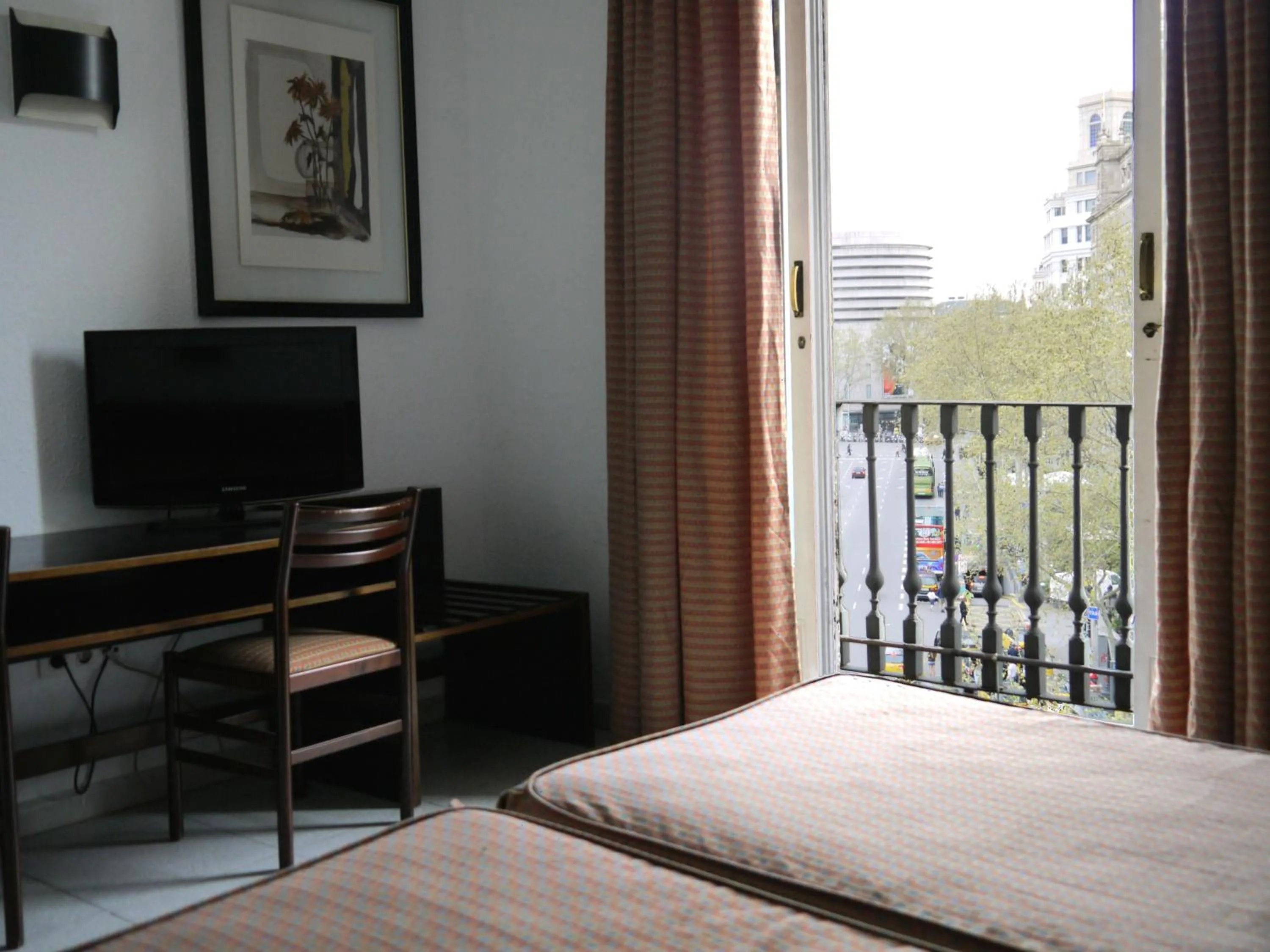 View (from property/room), Bed in Hotel Monegal