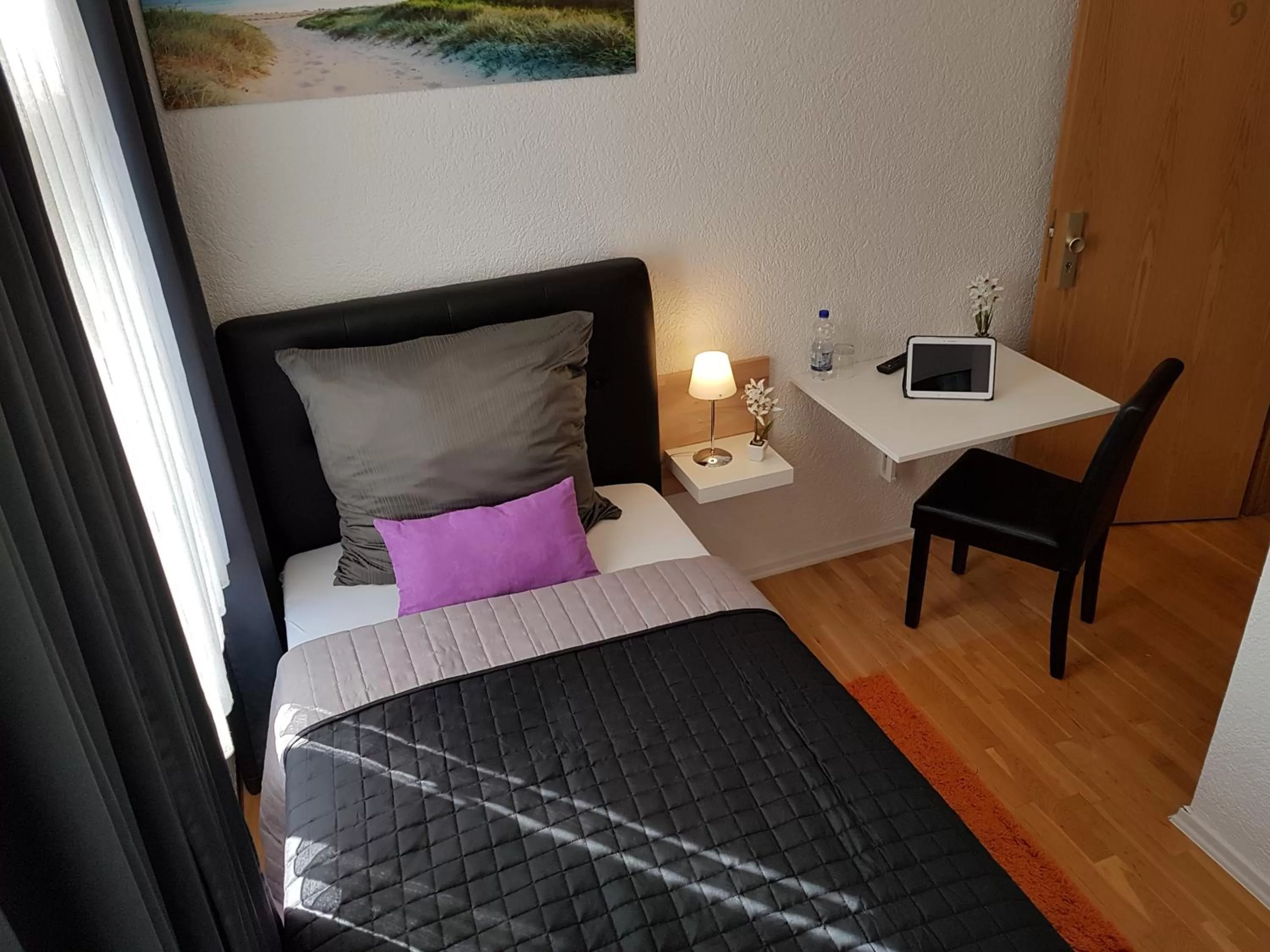 Bed in Hotel Exquisite