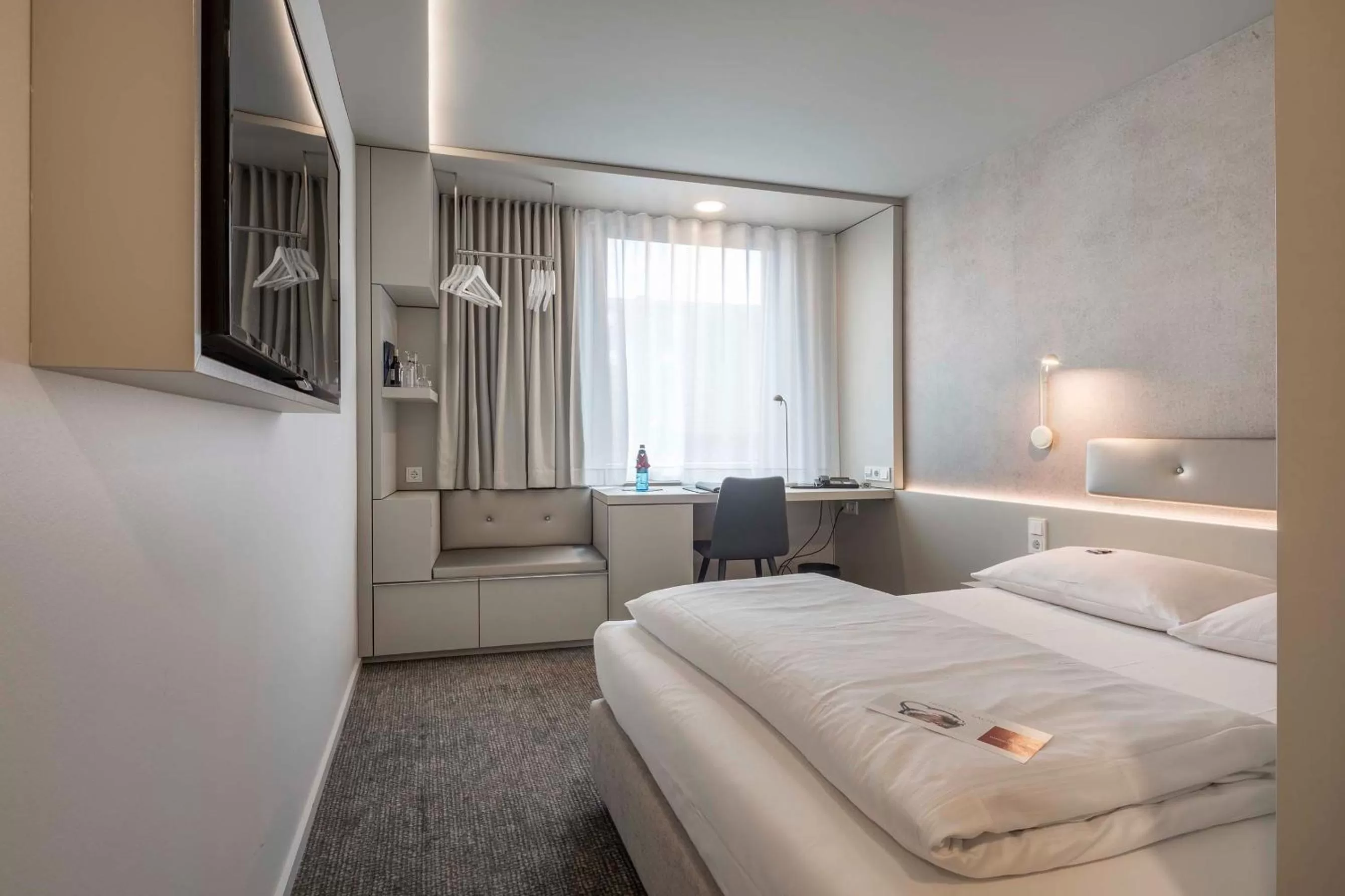 Photo of the whole room, Bed in Stadthotel Münster