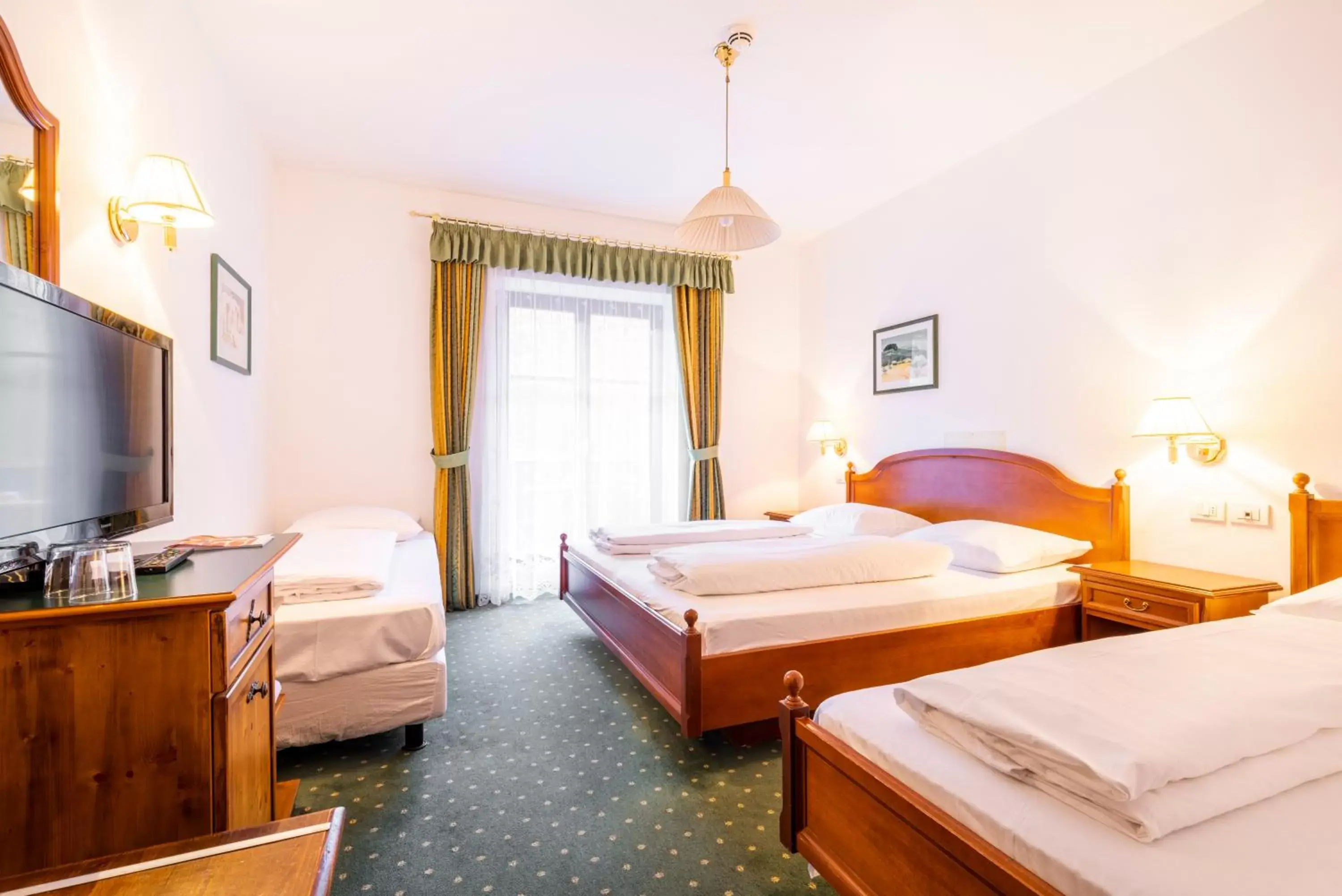 Comfort Quadruple Room in Hotel Restaurant Putzer Comfort Quadruple Room in Hotel Restaurant Putzer