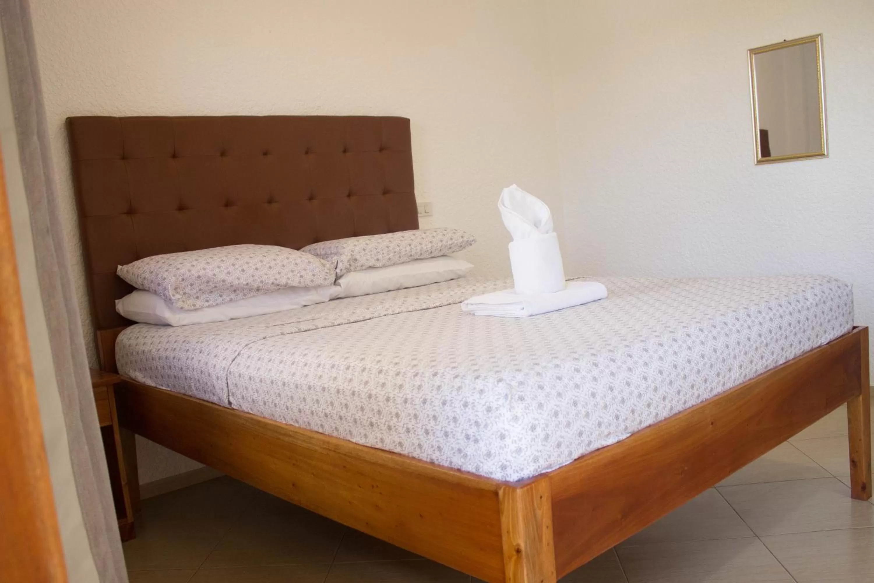 Bed in Jugalis Hotel and Restaurant