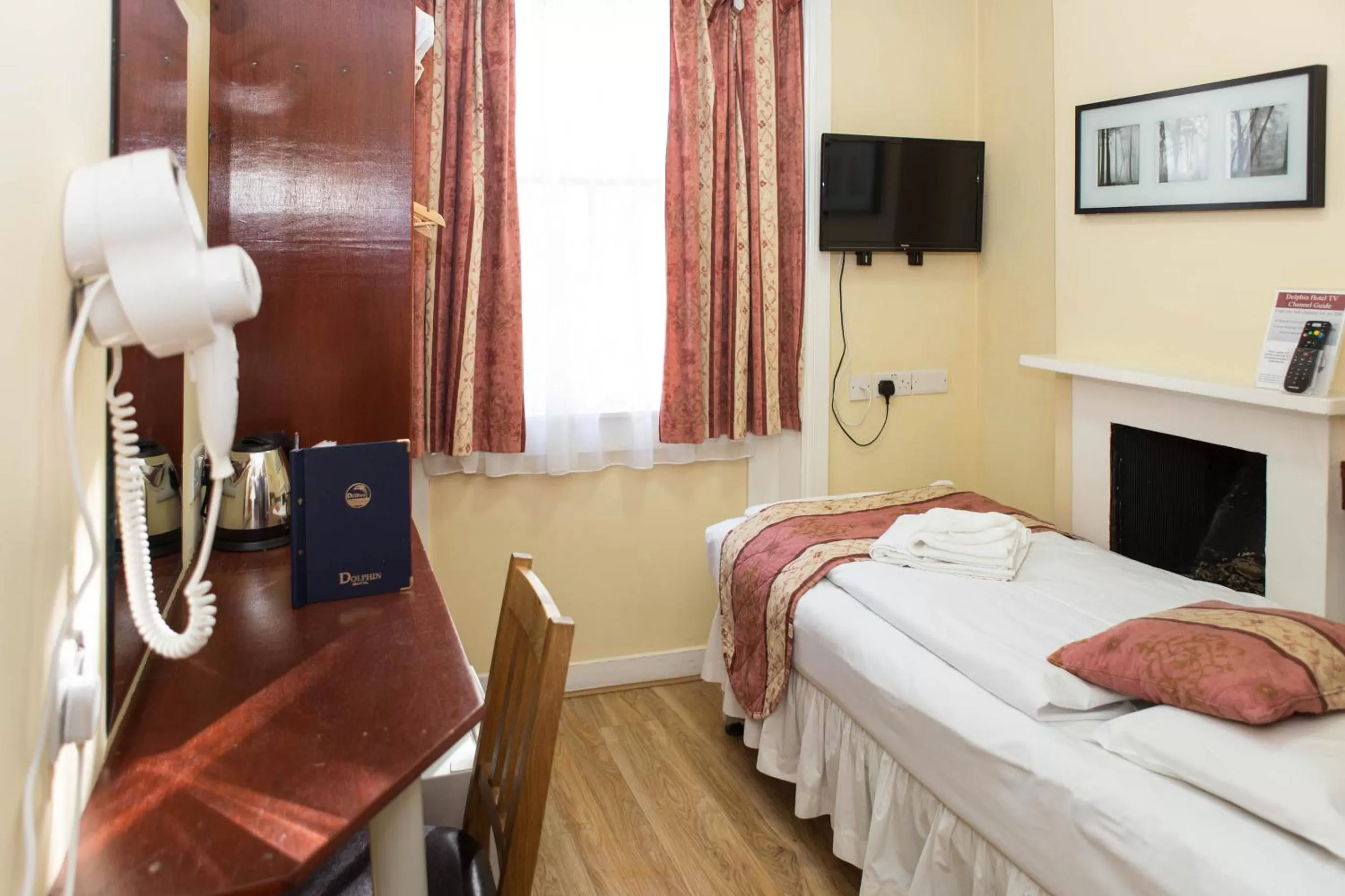 Bed in Dolphin Hotel