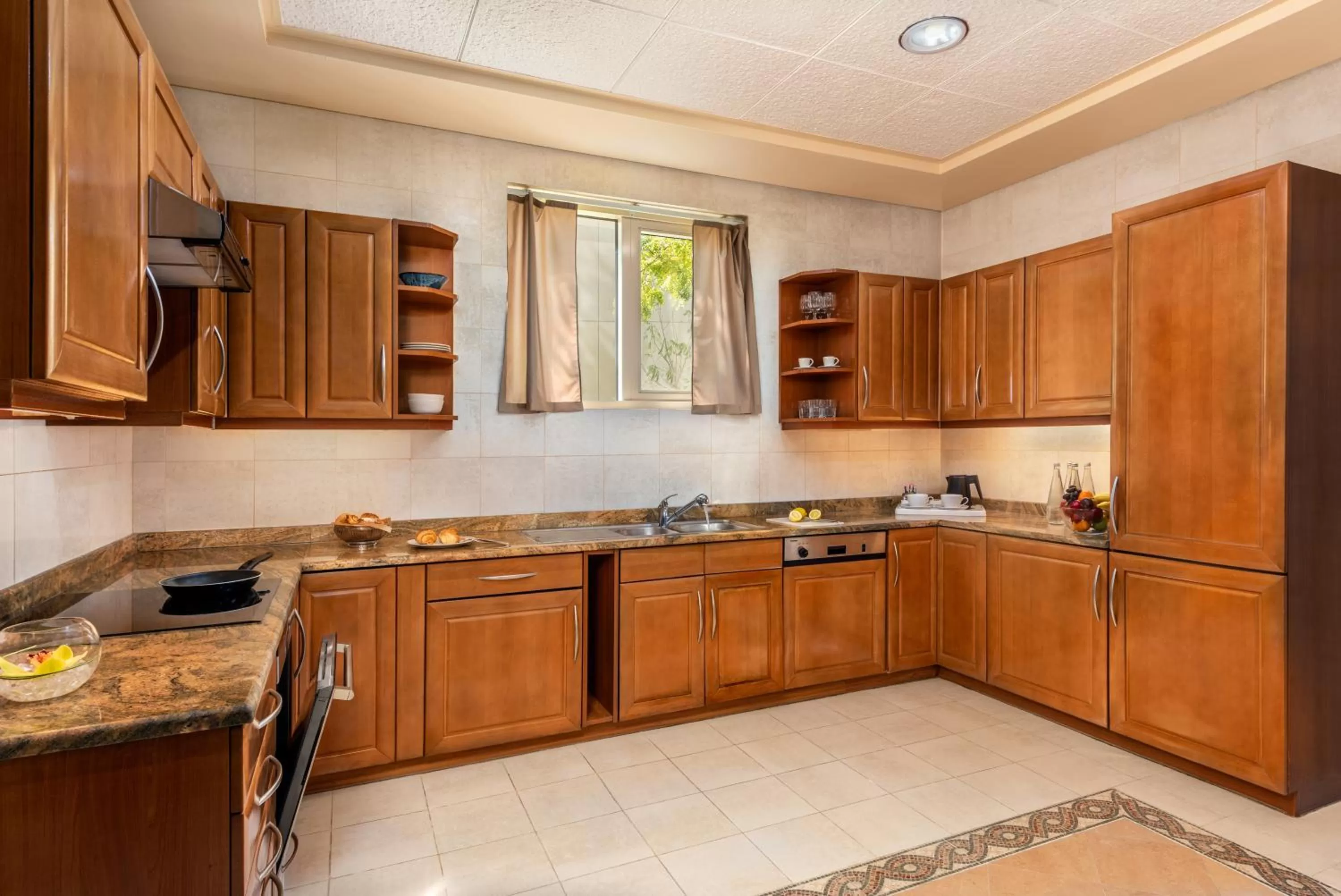 kitchen in Al Raha Beach Resort & Spa