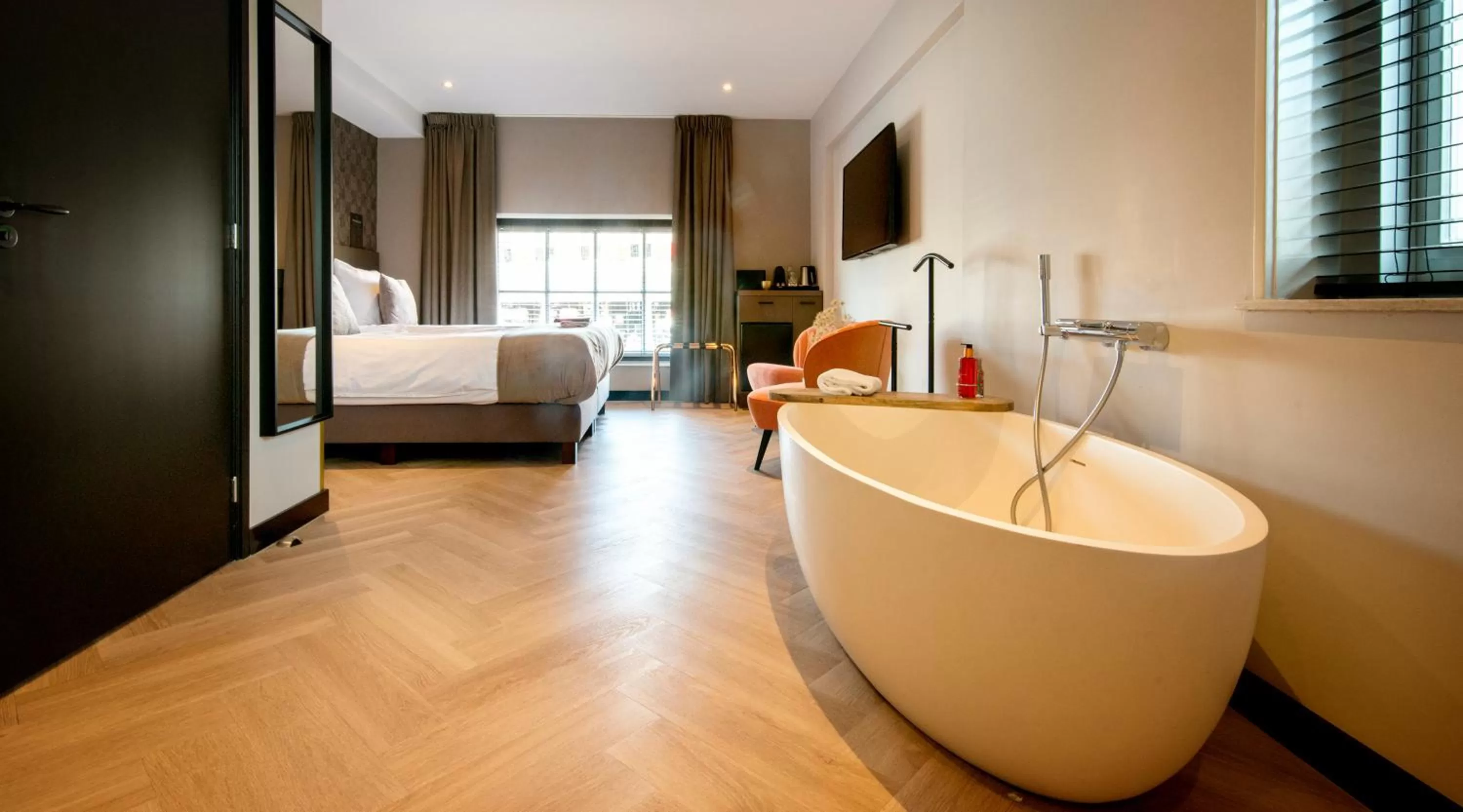 Bed in Harbour Suites Boutique Hotel