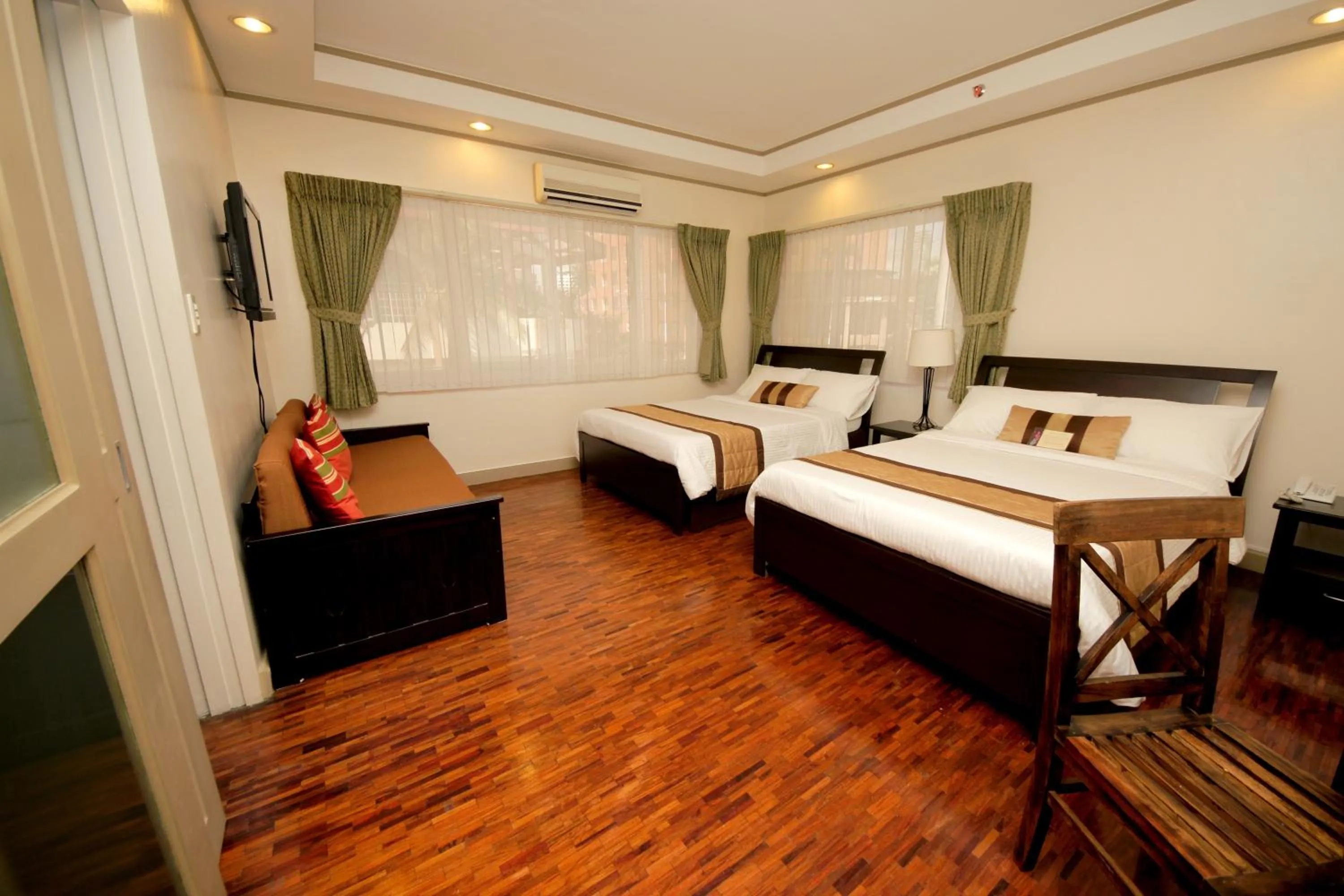 TV and multimedia, Bed in Casa Pura Inn and Suites