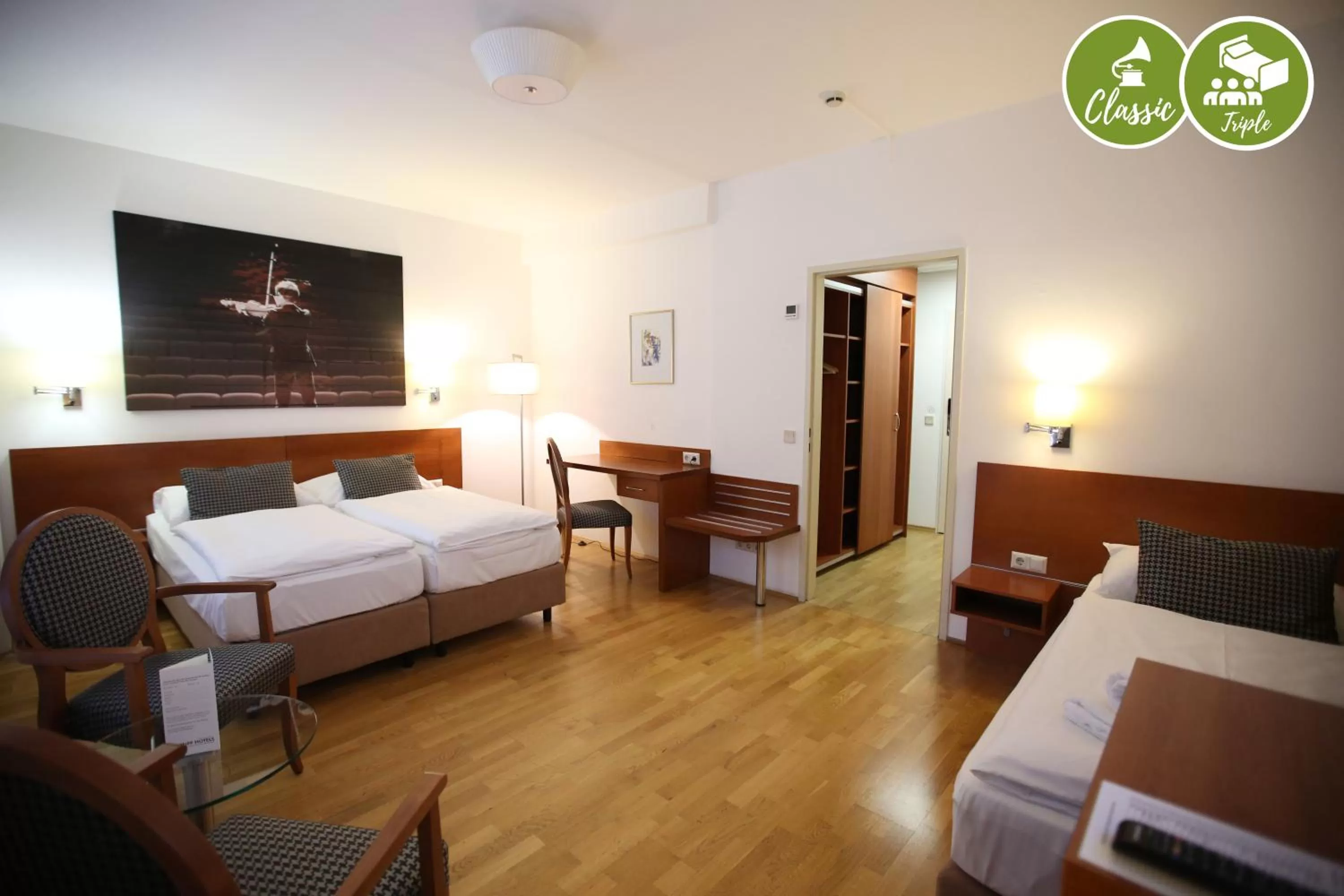 Seating area, Bed in arte Hotel Wien Stadthalle