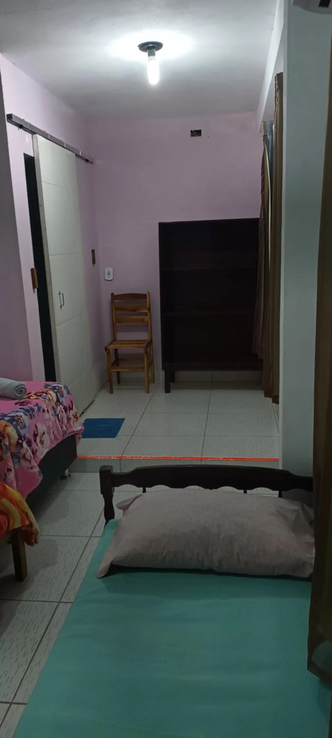 Bed in Pousada dos Ventos