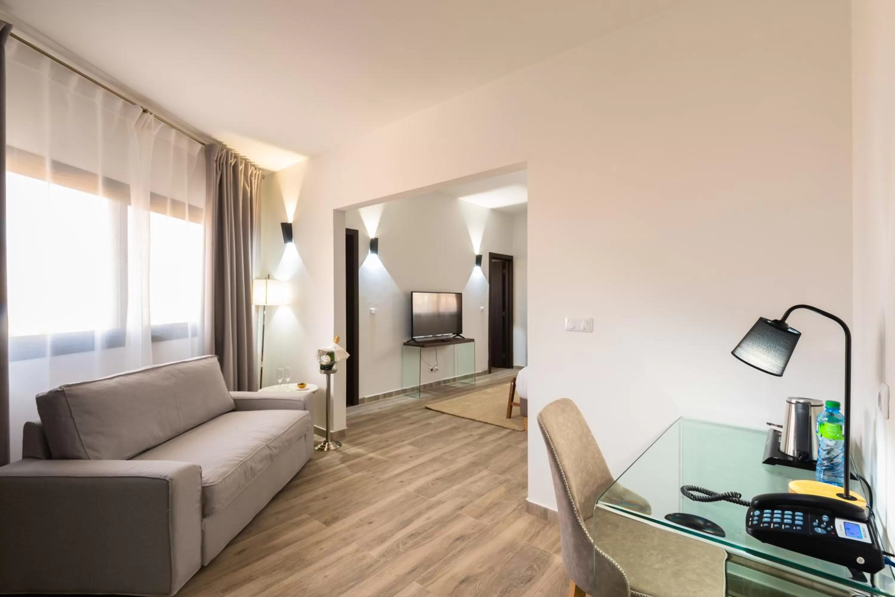 TV and multimedia, Seating Area in Hotel L'Adresse Dakar