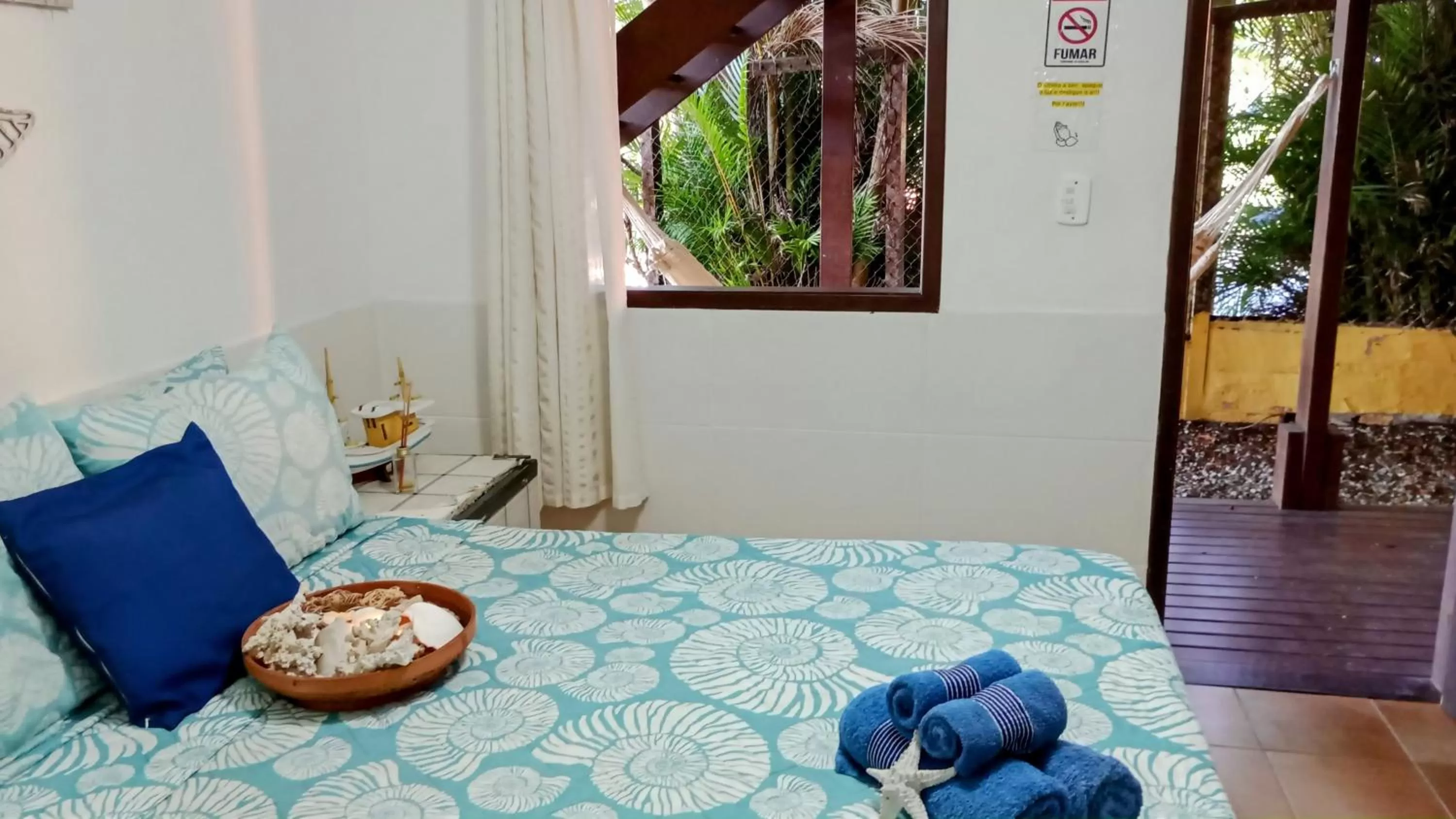 Bed in Hibiscos Pousada