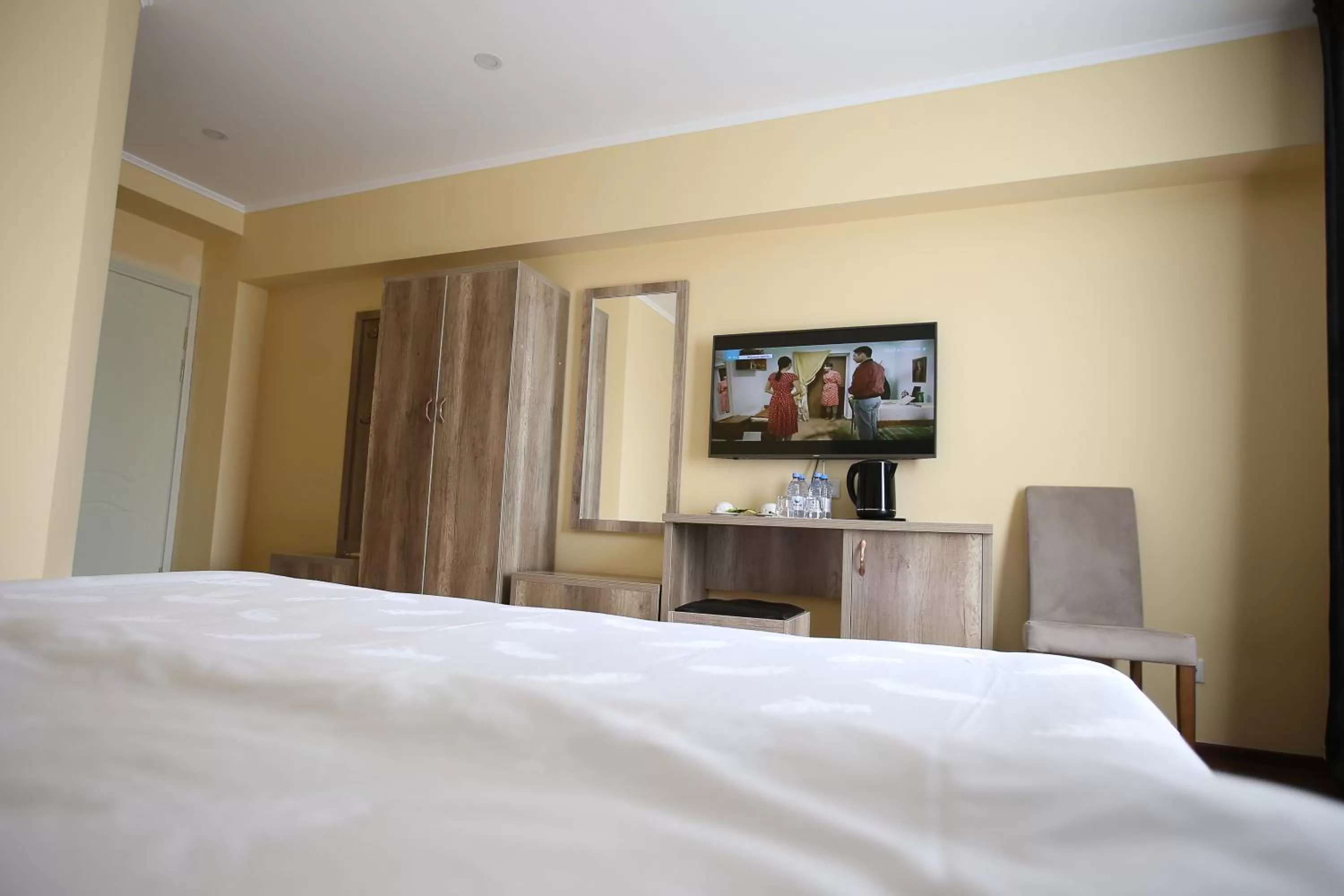 Bed in Altai Business Hotel