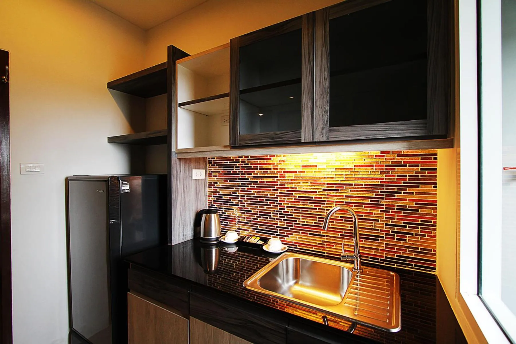 Coffee/tea facilities in The Contrast i Hotel