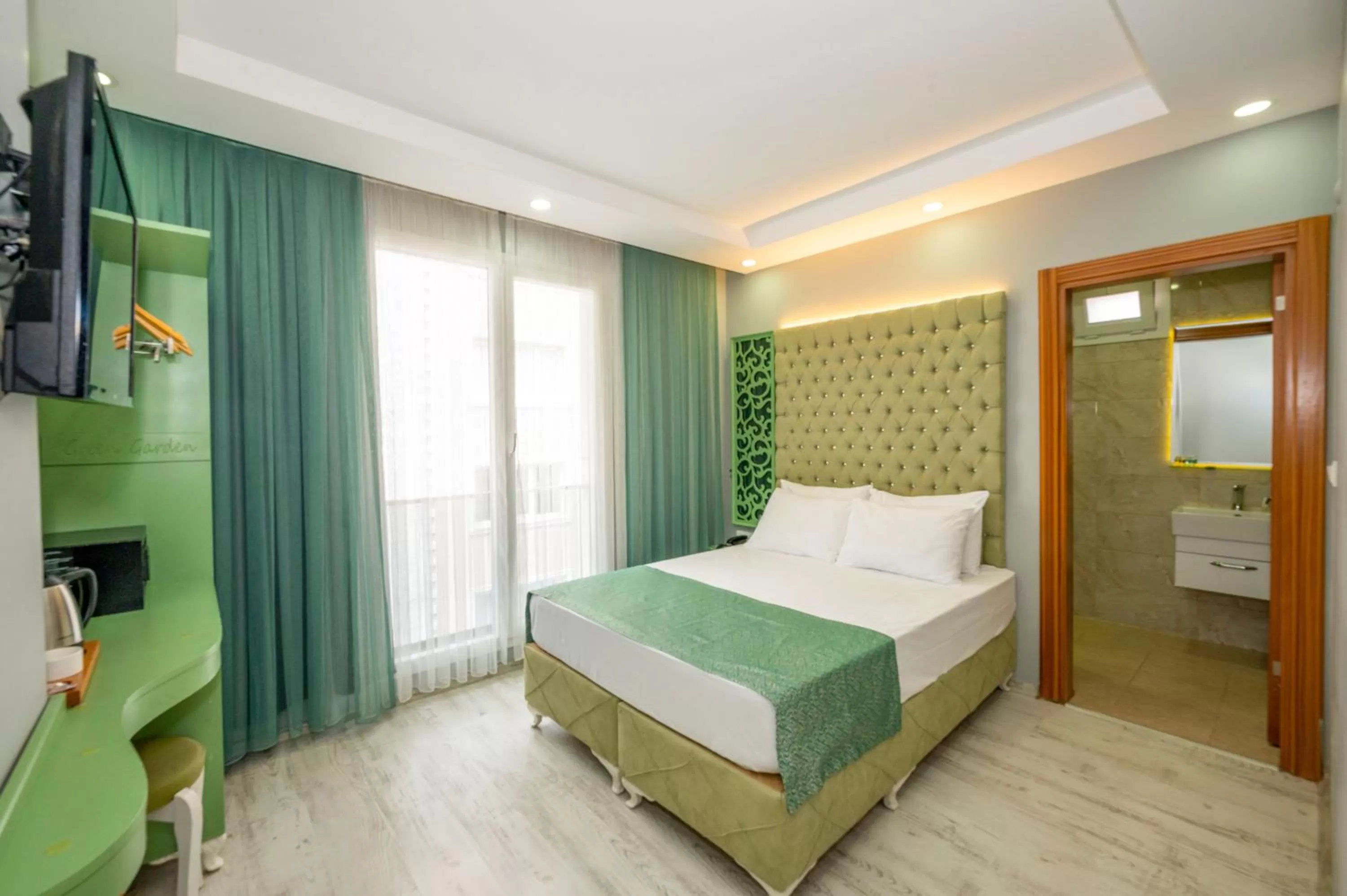 Photo of the whole room, Bed in Green Garden Hotel