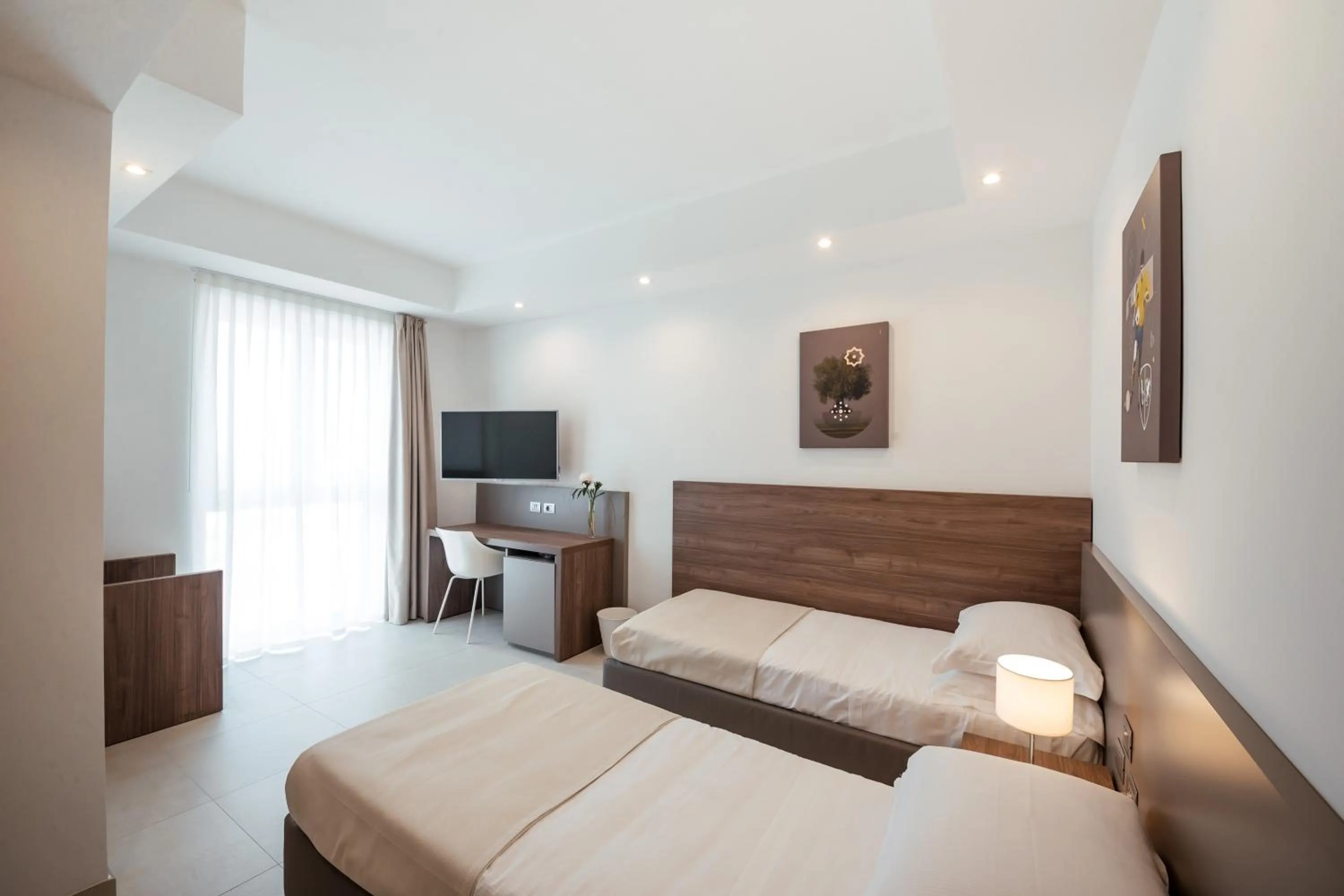 Bed in Grieco Business & Spa Hotel