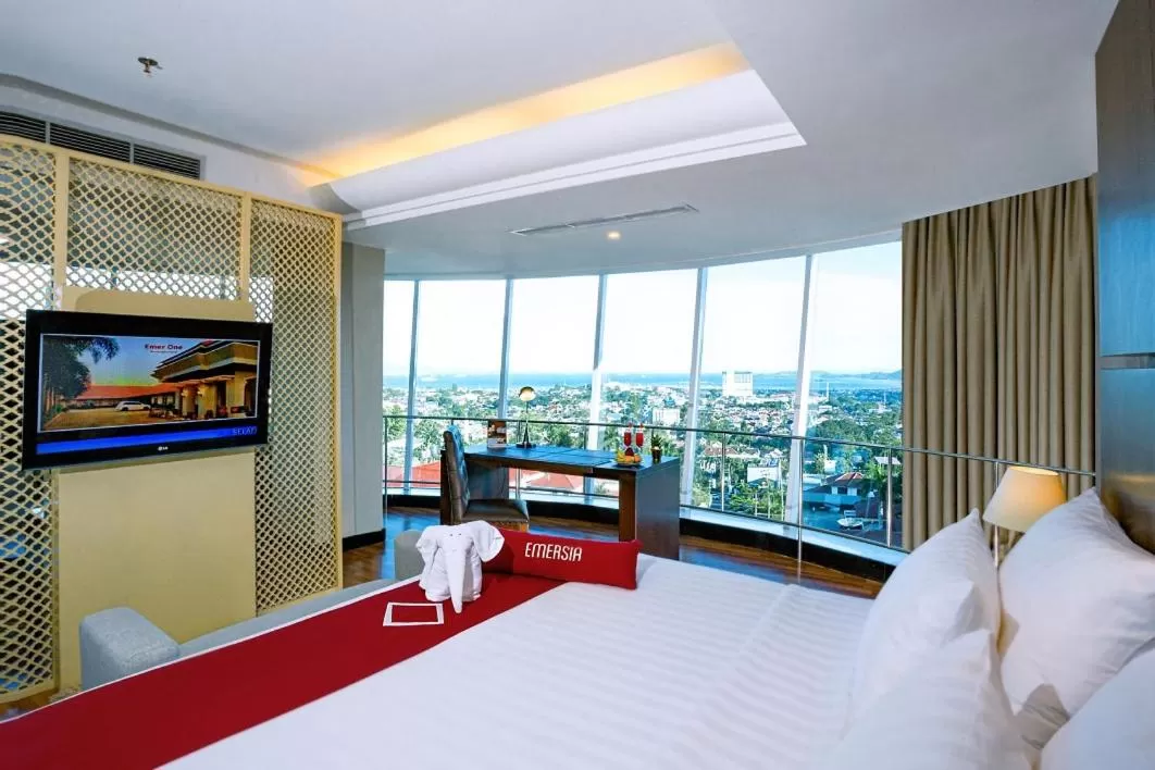 Bed in Emersia Hotel and Resort