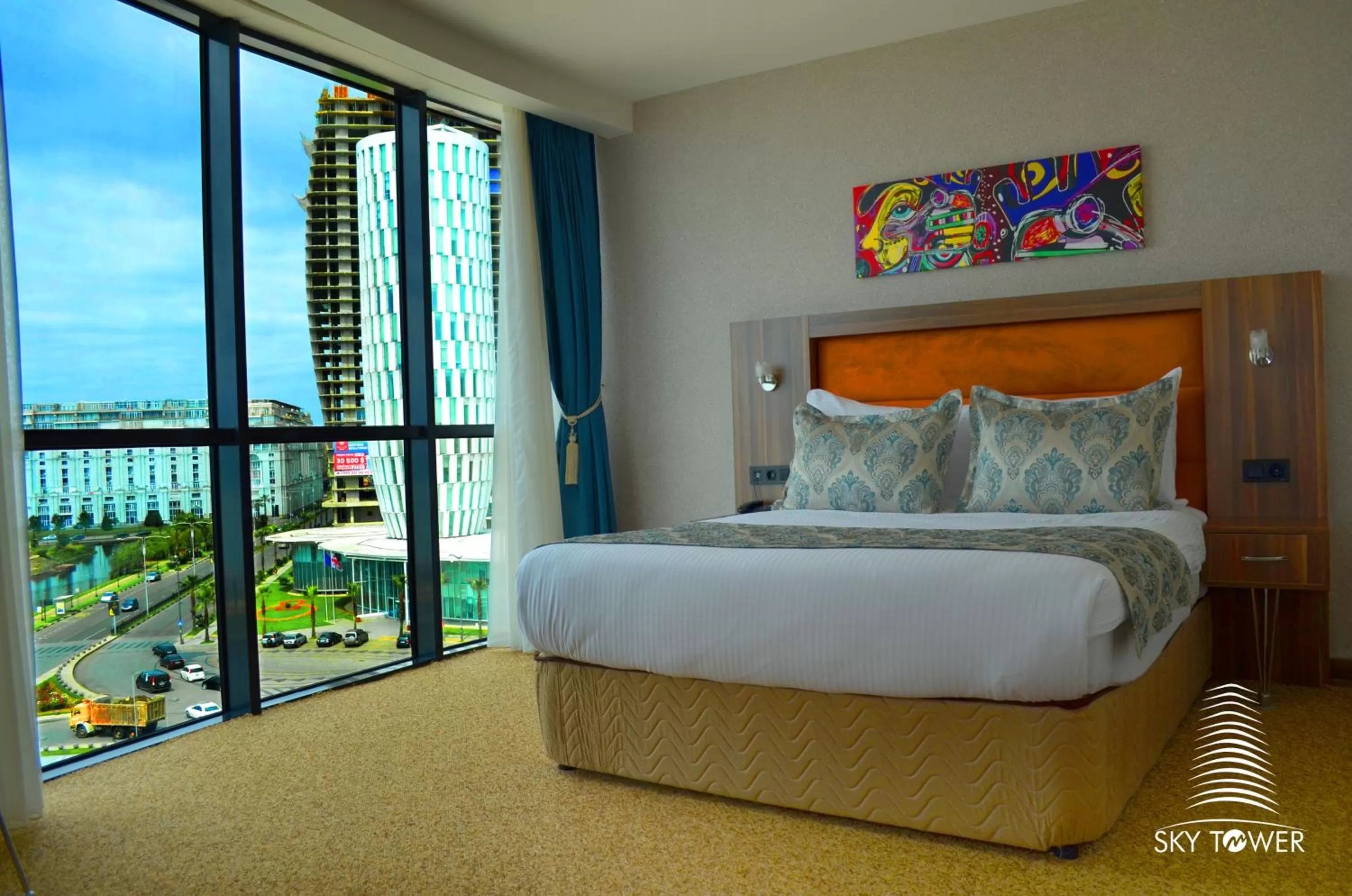 Photo of the whole room, Bed in Sky Tower King Hotel