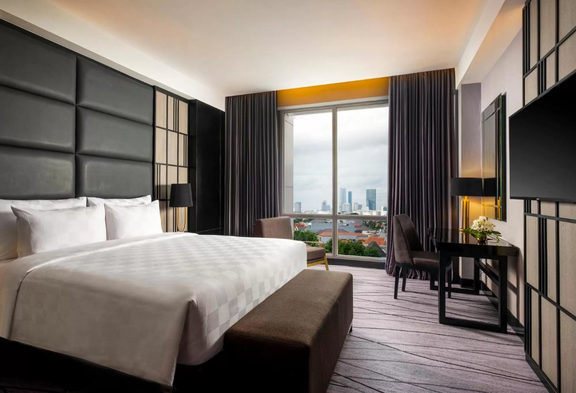 Photo of the whole room, Bed in Grand Swiss-Belhotel Darmo