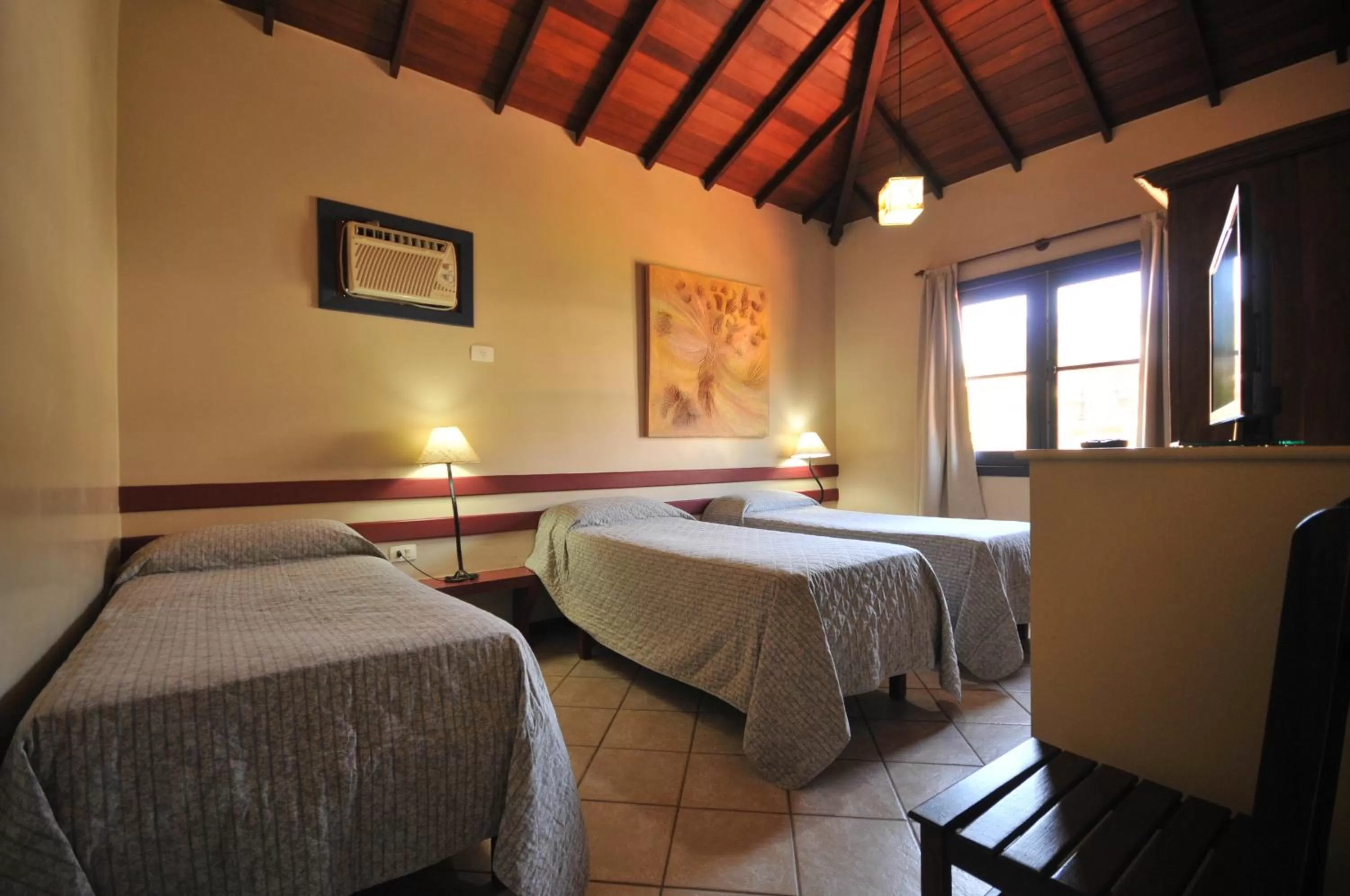 Bed in Aguabúzios Hotel