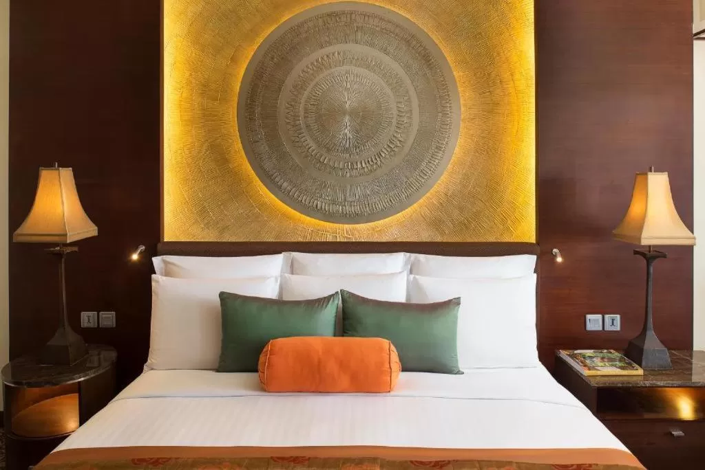 Bed in Anantara Riverside Bangkok Resort