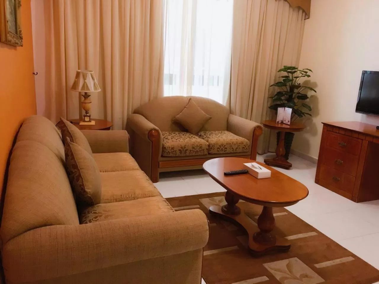 Living room in Al Maha Regency Hotel Suites - Managed by Aoudi Consultants