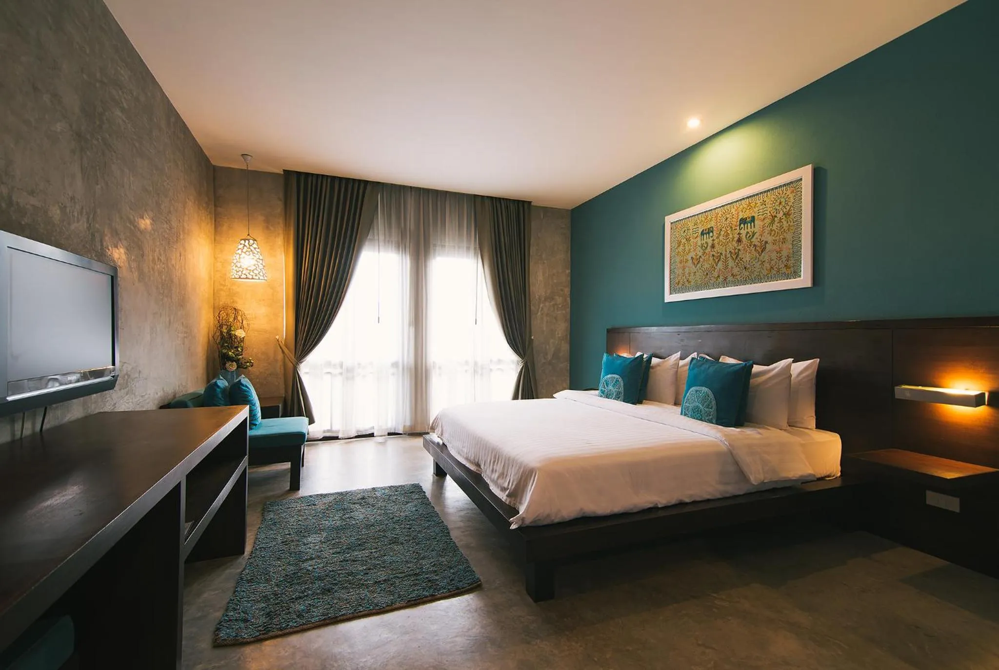 Photo of the whole room, Bed in Ketawa Pet Friendly Hotel