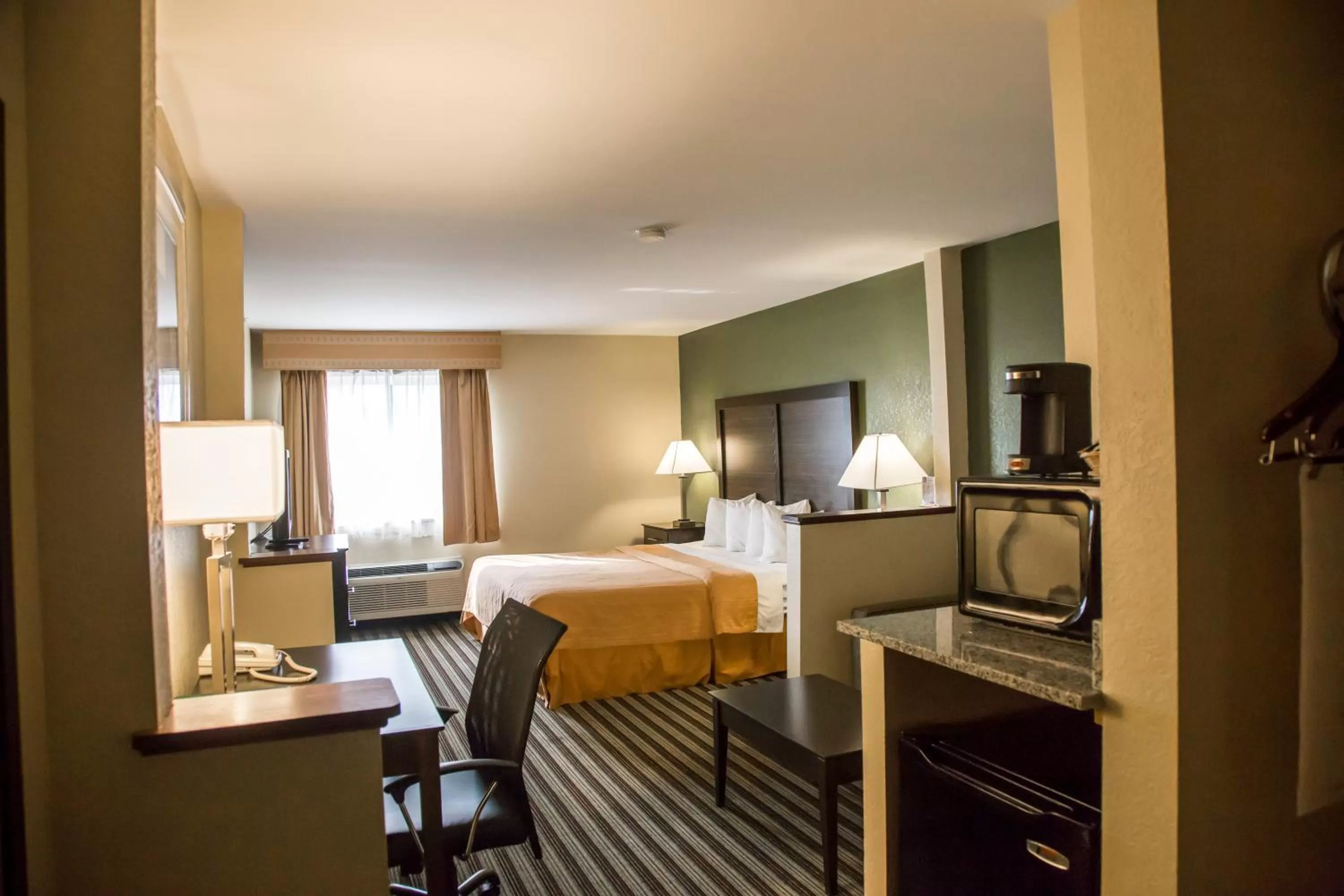 Bed in Quality Inn & Suites Loves Park near Rockford