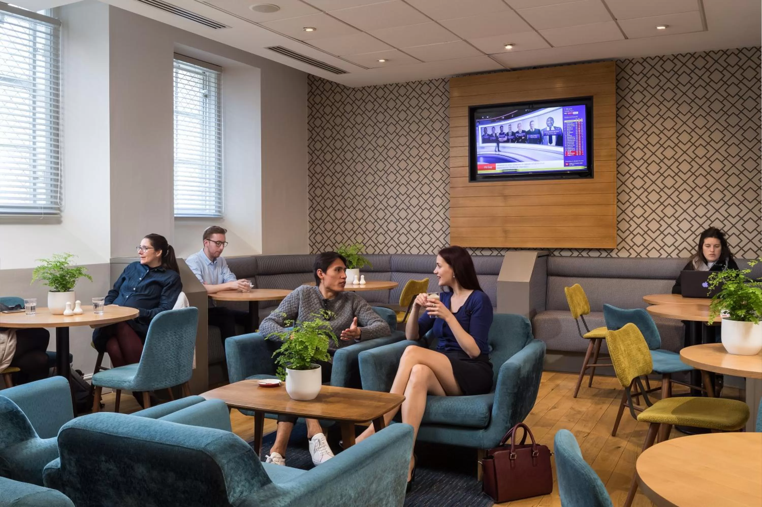 Communal lounge/ TV room in The Goodenough Hotel London