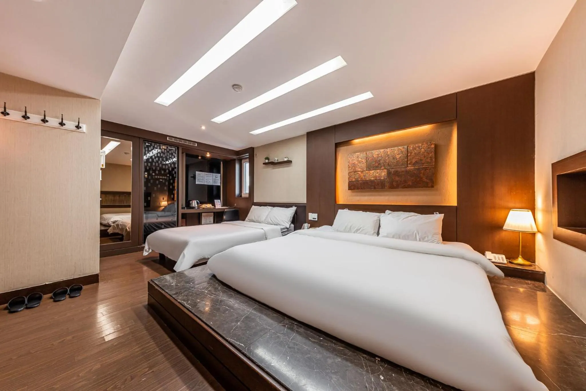 Bed in Friendly DH Naissance Hotel by Mindrum Group