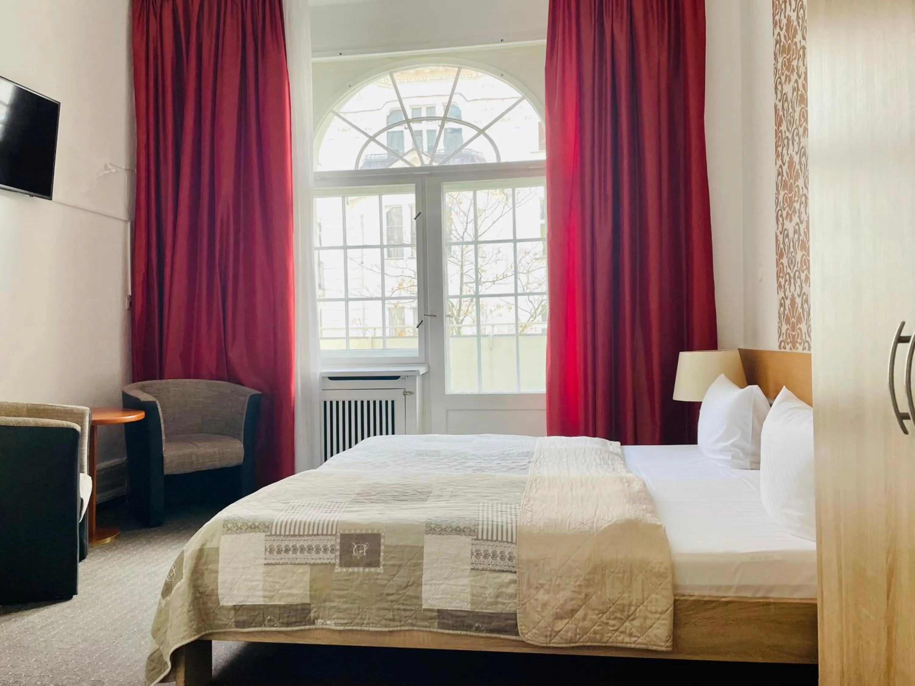 Bed in Hotel Castell am Kurfürstendamm