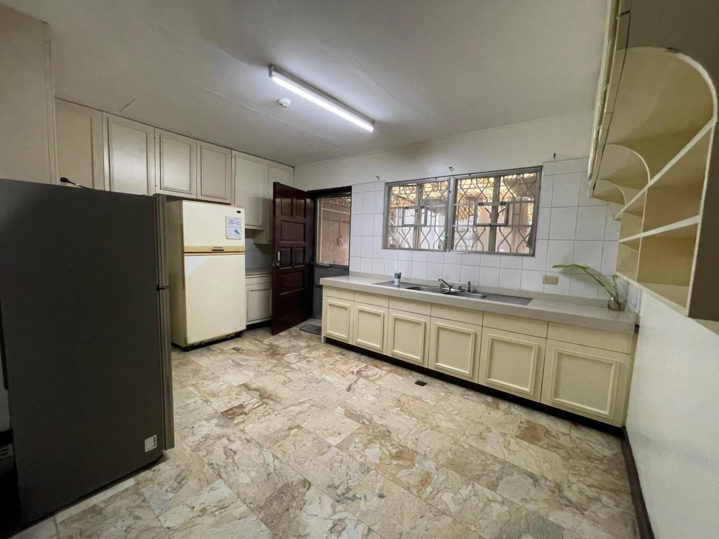 Kitchen or kitchenette in 1888 Staycation Inn by Cocotel