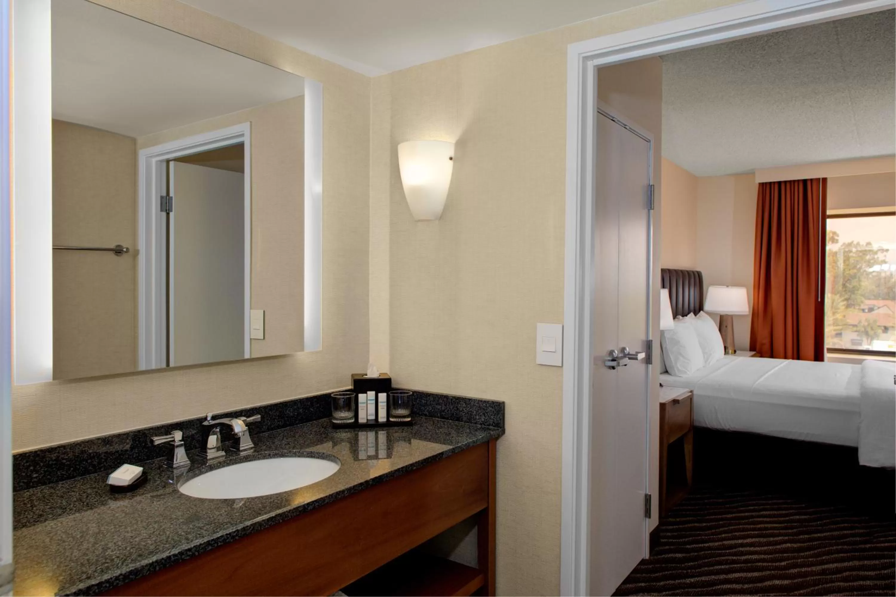 Bathroom, Bed in Embassy Suites by Hilton Phoenix Scottsdale
