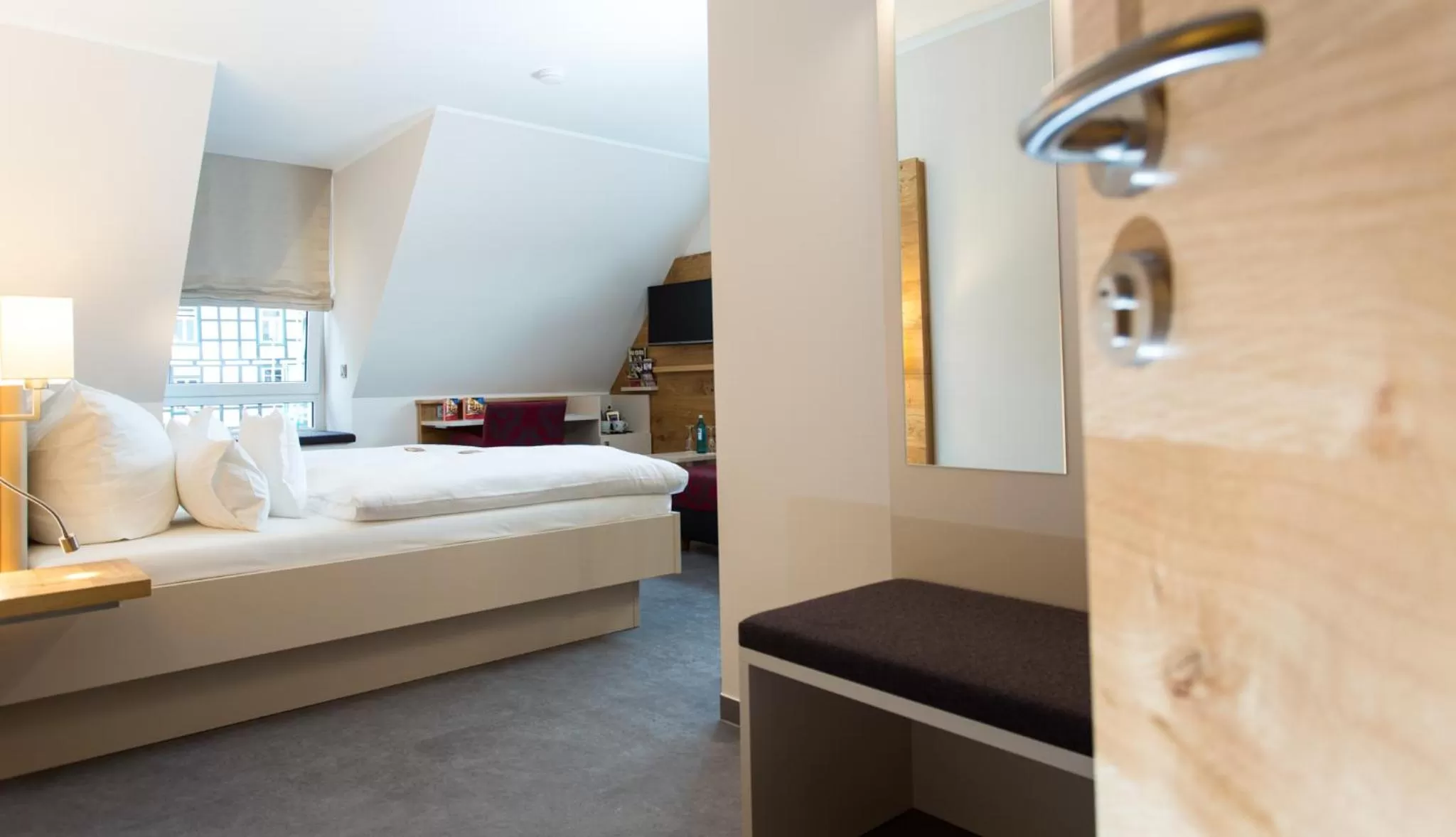 Photo of the whole room, Bed in Höger's Hotel & Restaurant