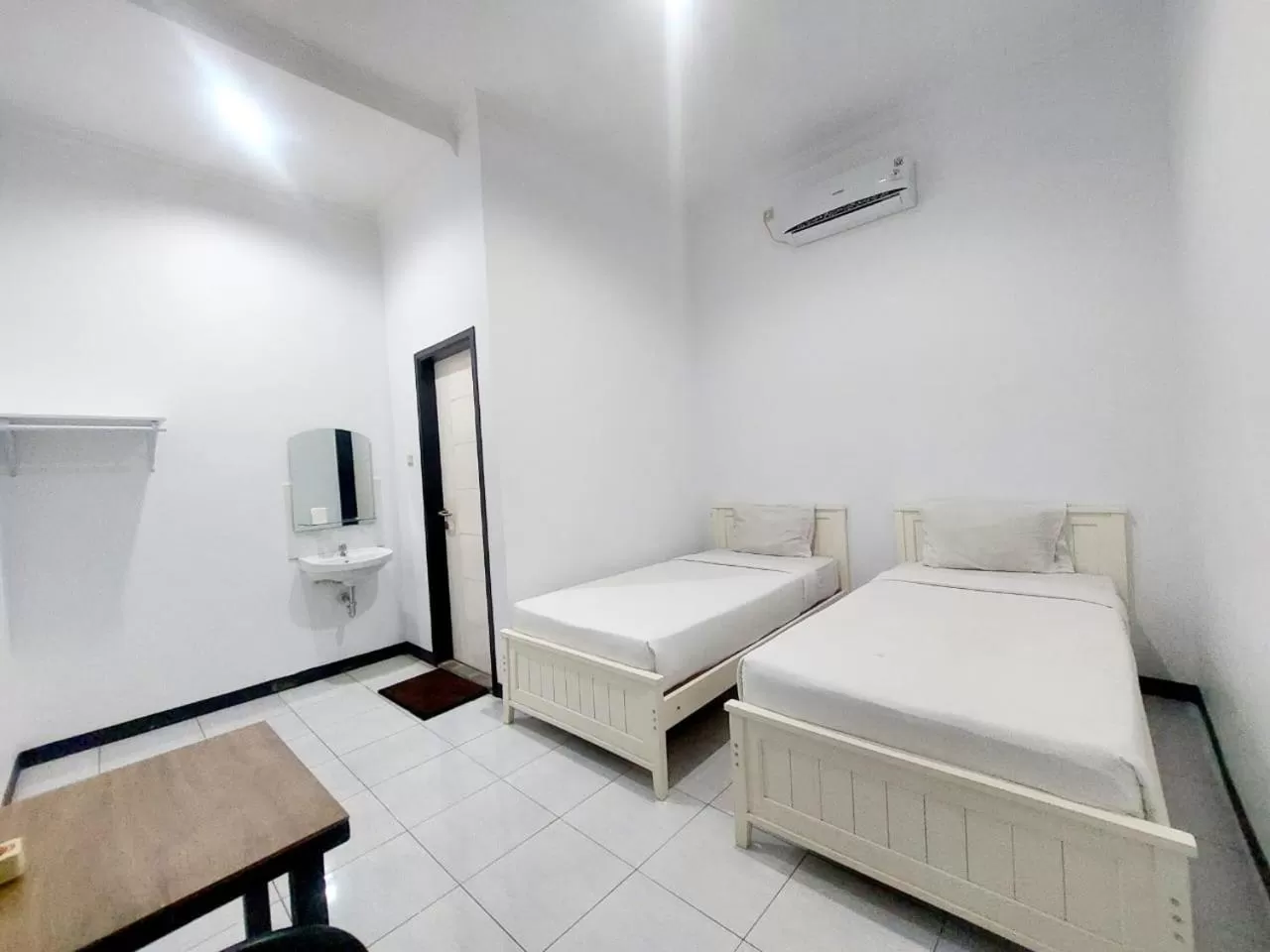 Bed in COZY STAY KUPANG