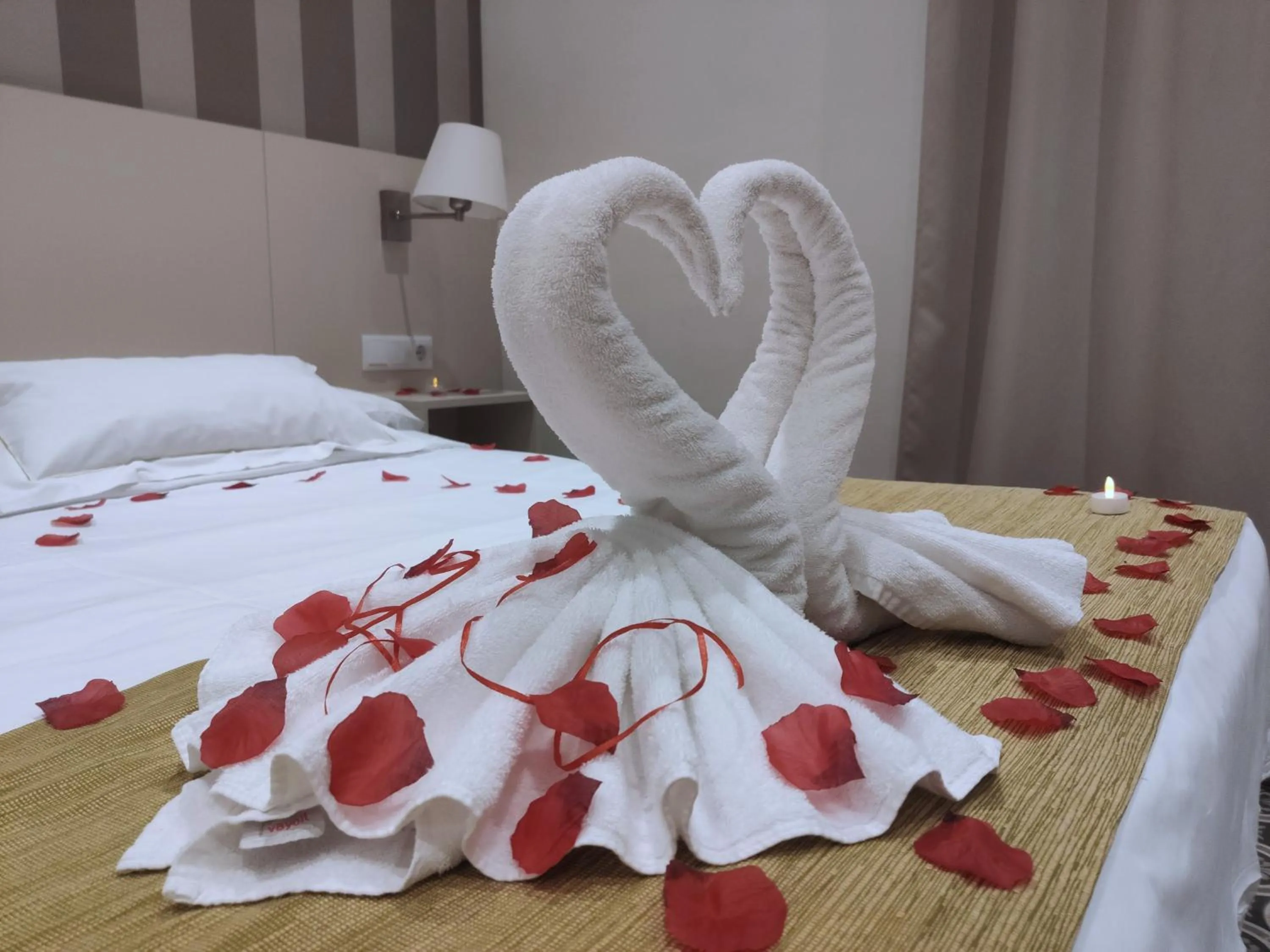 Bed in Hotel San Lorenzo Boutique Plaza