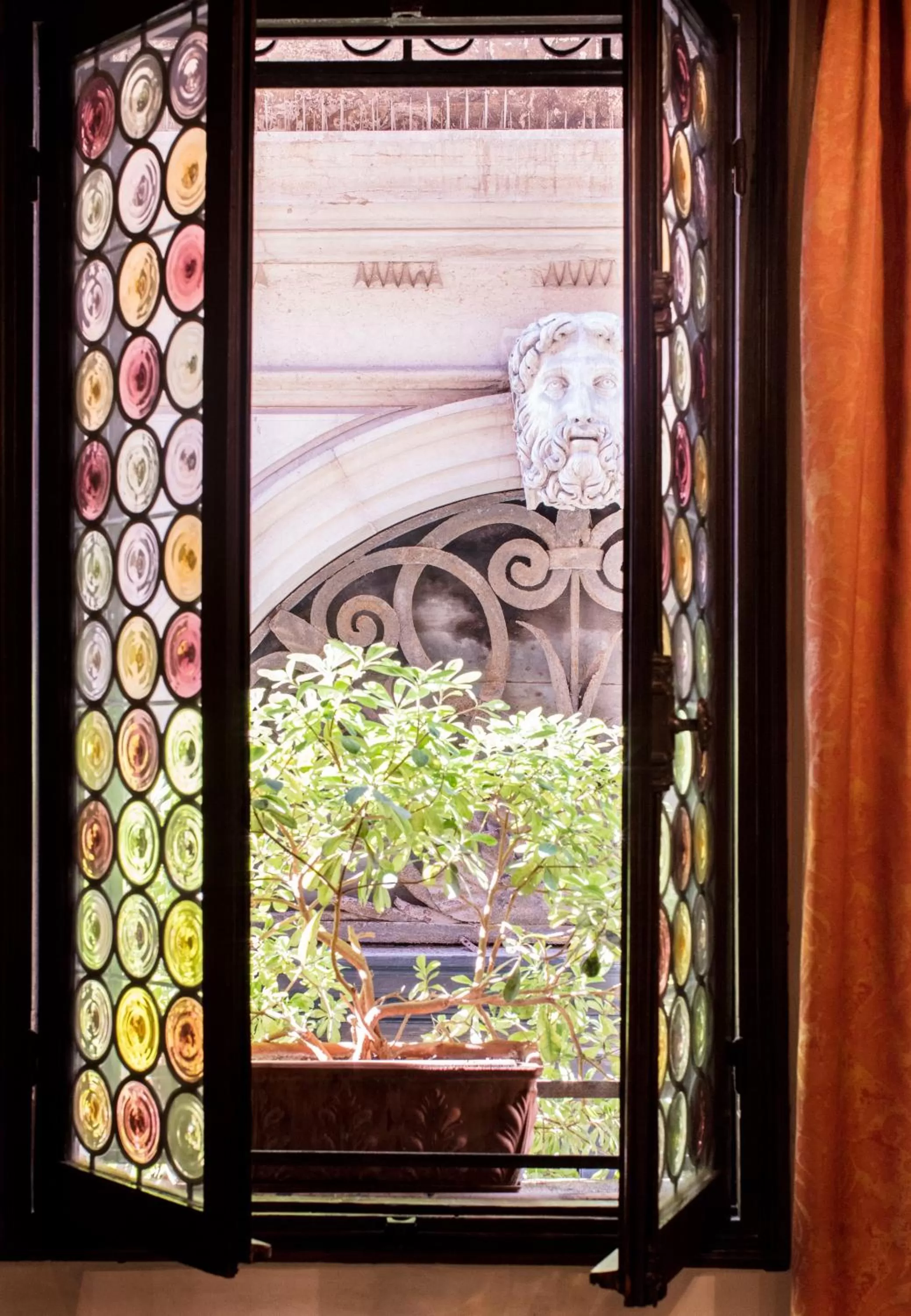 Bedroom in Novecento Boutique Hotel
