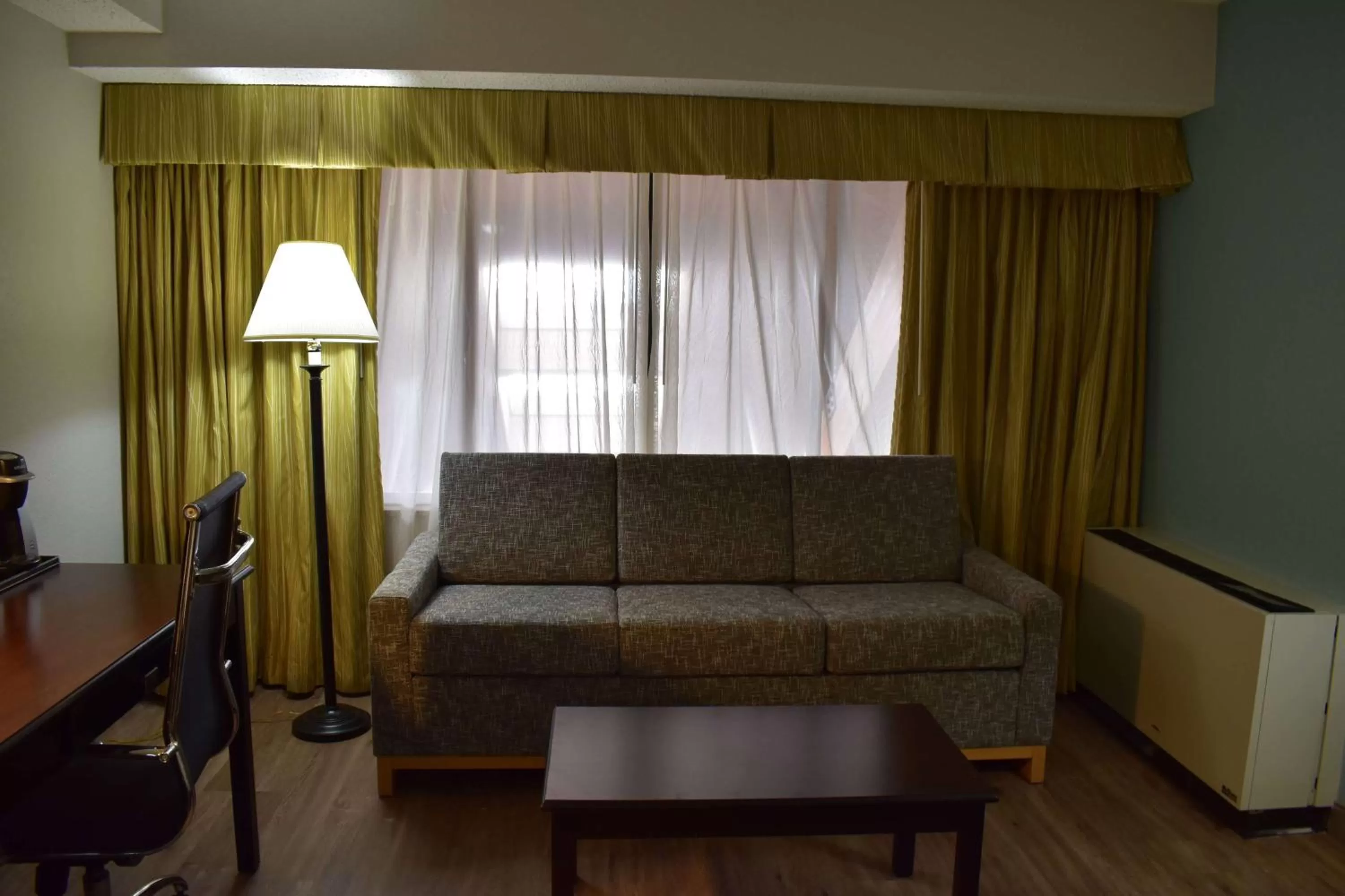 Photo of the whole room, Seating Area in Wyndham Garden Ann Arbor