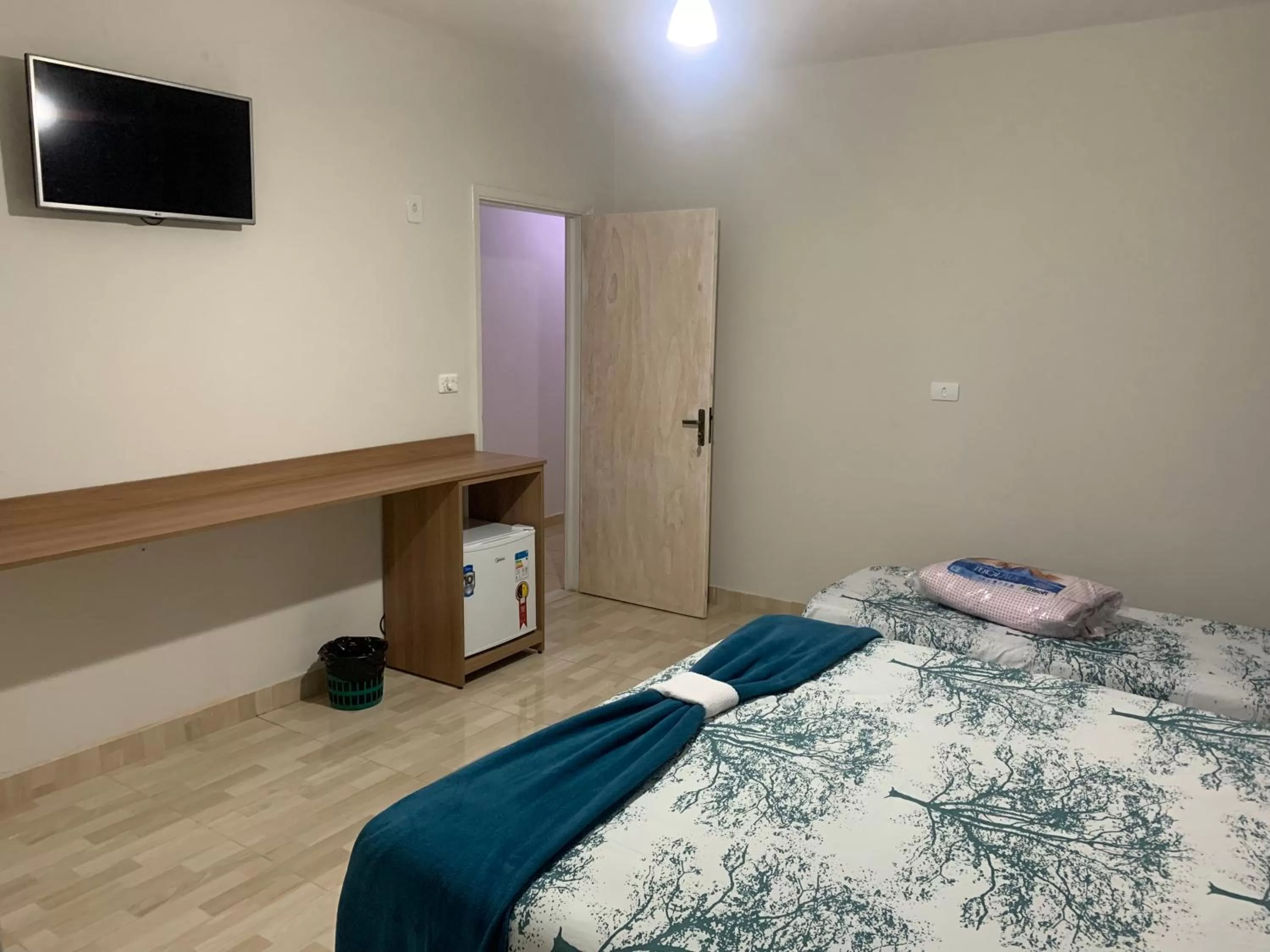 Bed in Pousada Ananda São Pedro