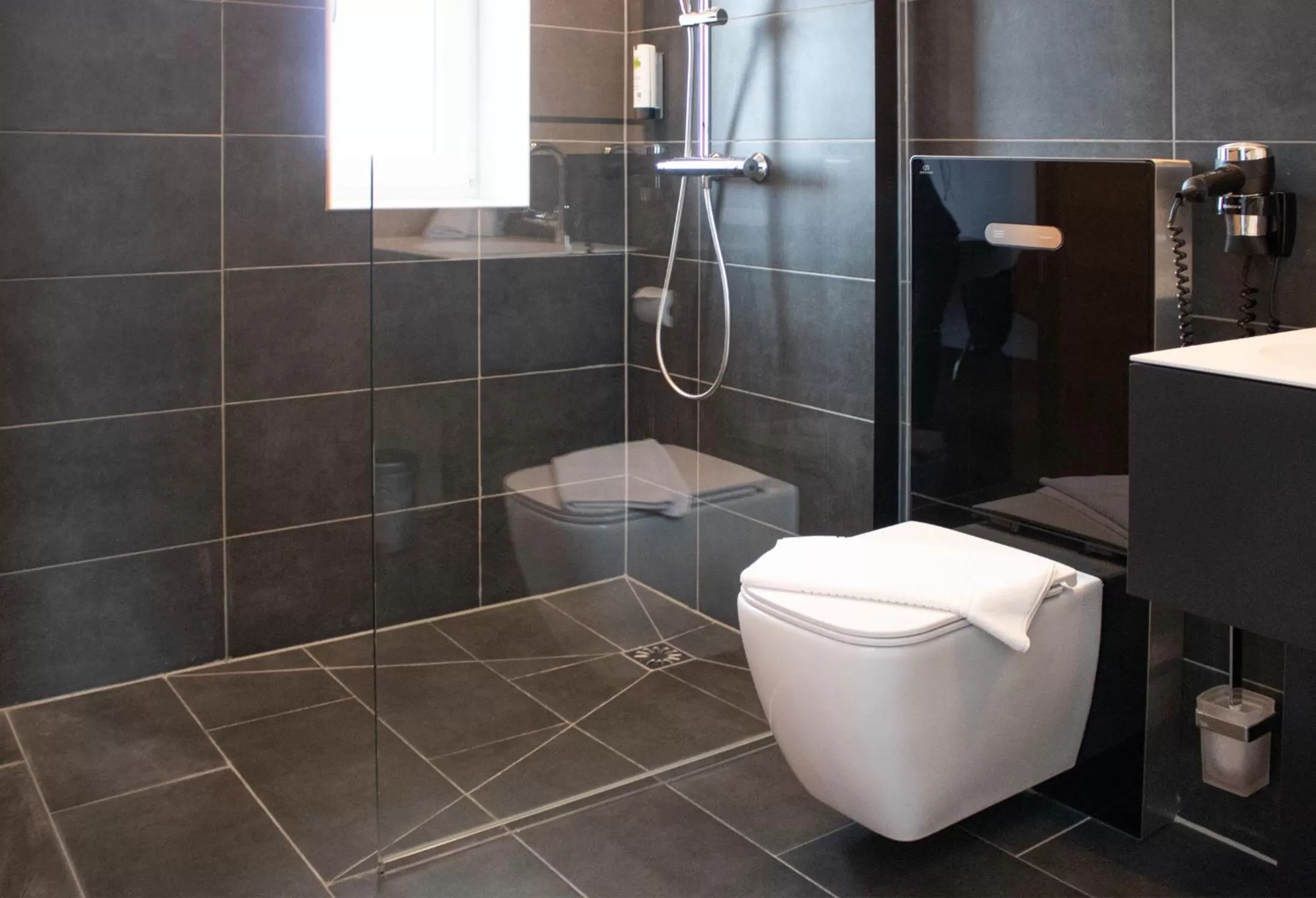 Bathroom in GA Hotel by WMM Hotels