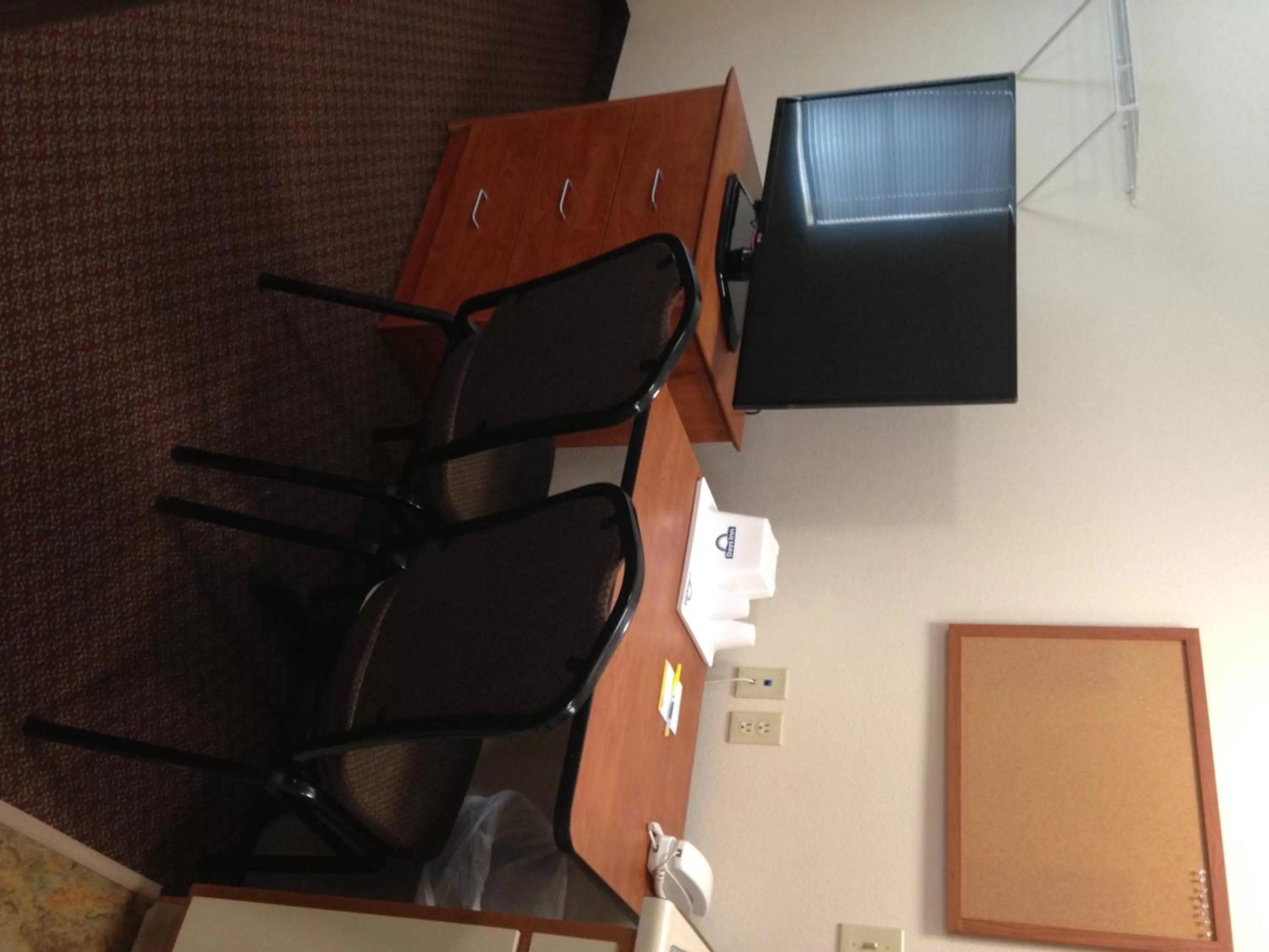 Seating area in Days Inn & Suites by Wyndham Rochester South