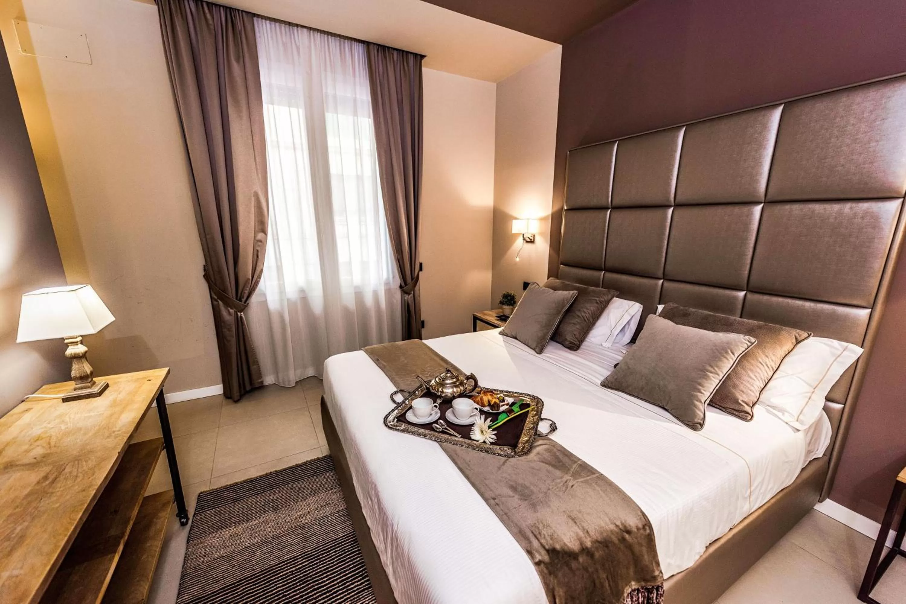 Bed in Delle Vittorie Luxury Rooms&Suites