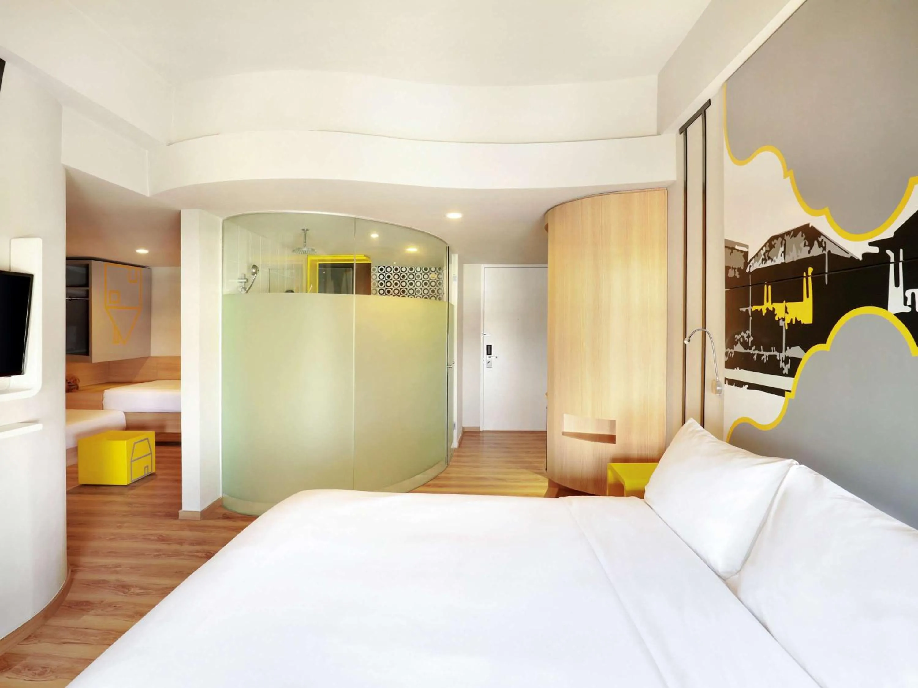 Photo of the whole room, Bed in KIMAYA Braga Bandung by HARRIS