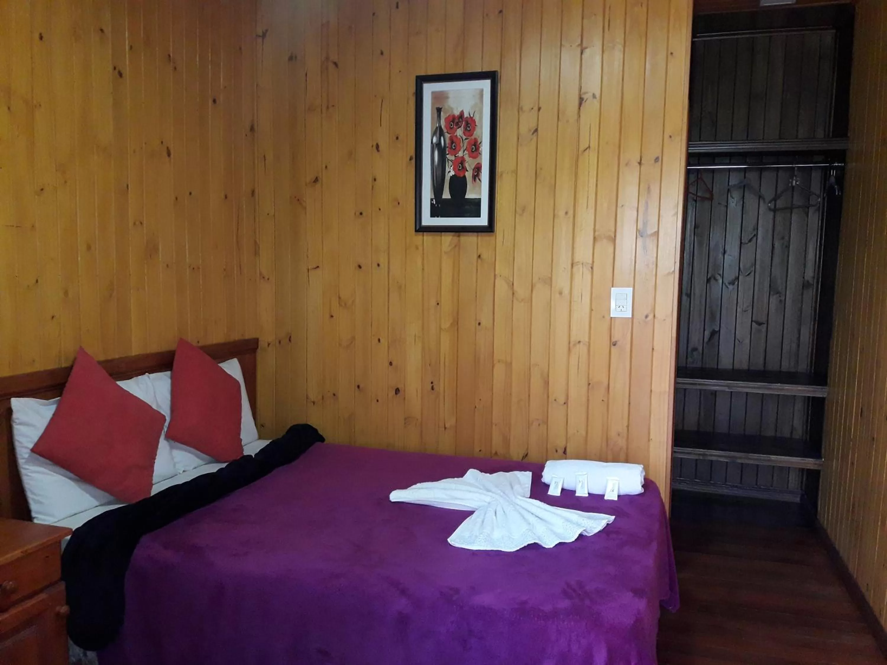 Bed in Petit Hotel Caraguata