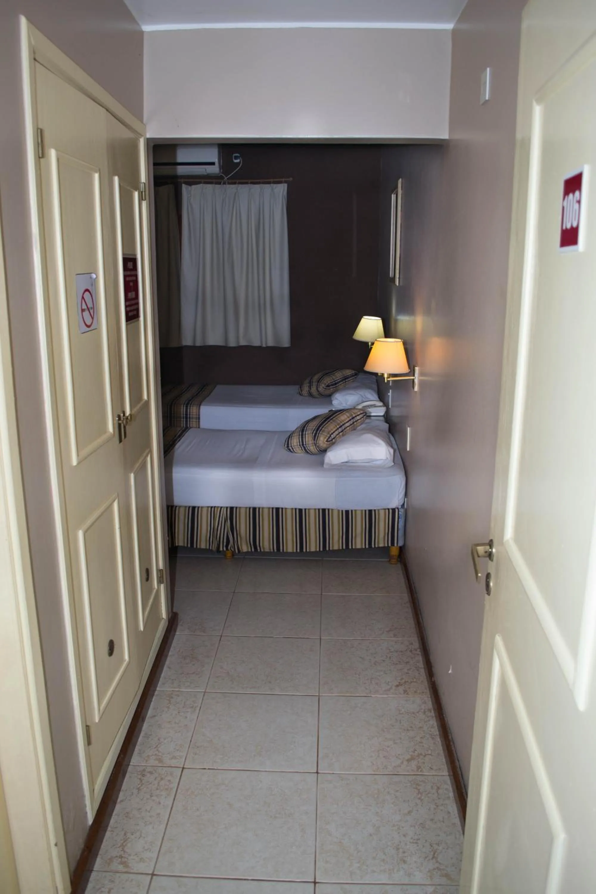 Bed in Marcopolo Suites Iguazu