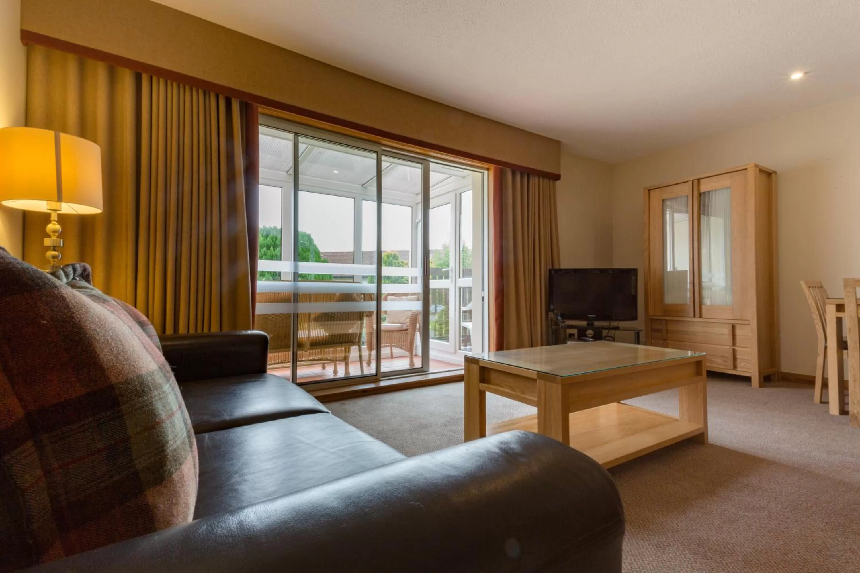 Communal lounge/ TV room in Macdonald Spey Valley Resort