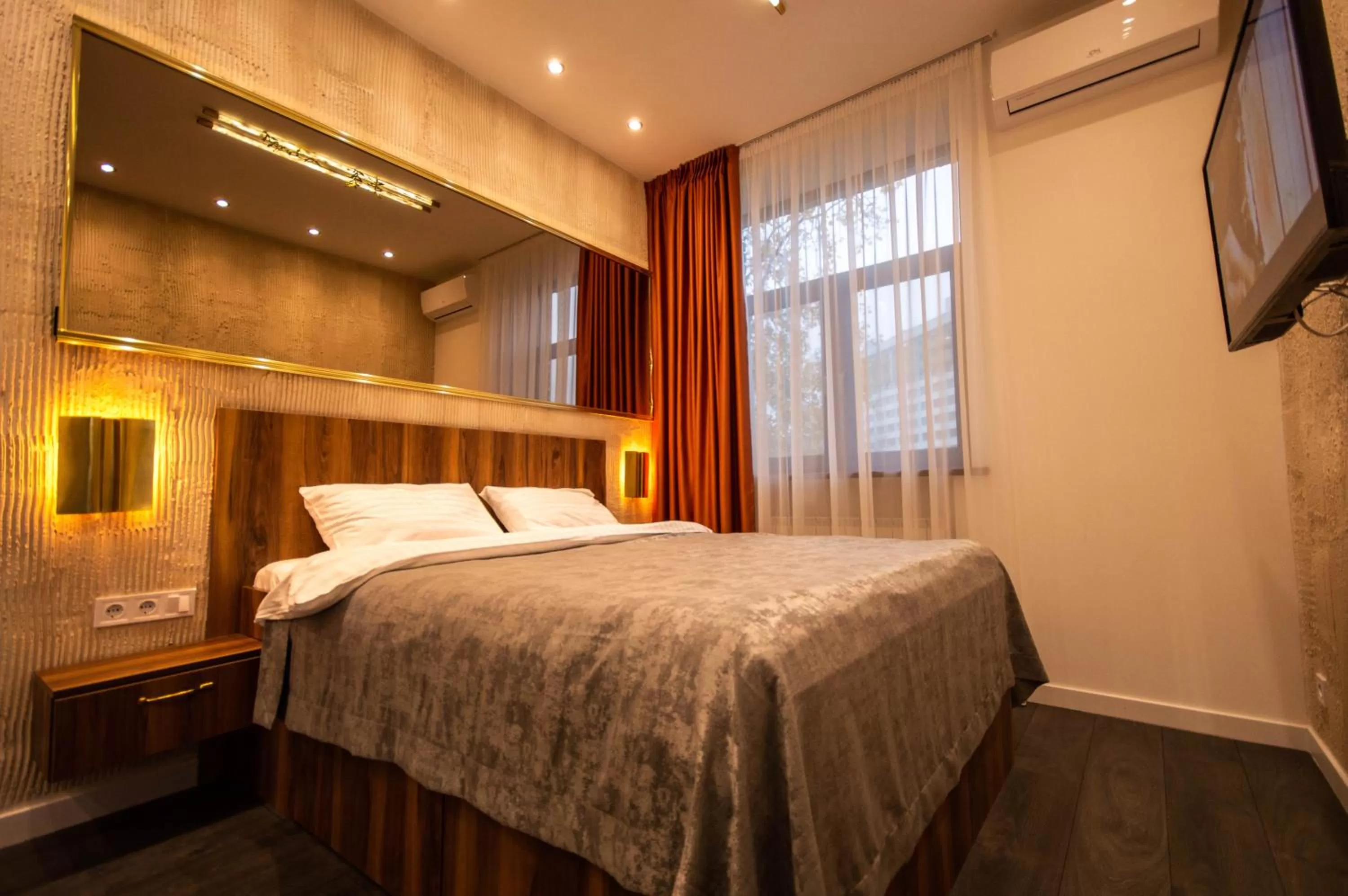 Bed in Kyiv Panorama Apartments near Gulliver