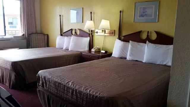 Bed in San Marcos Inn