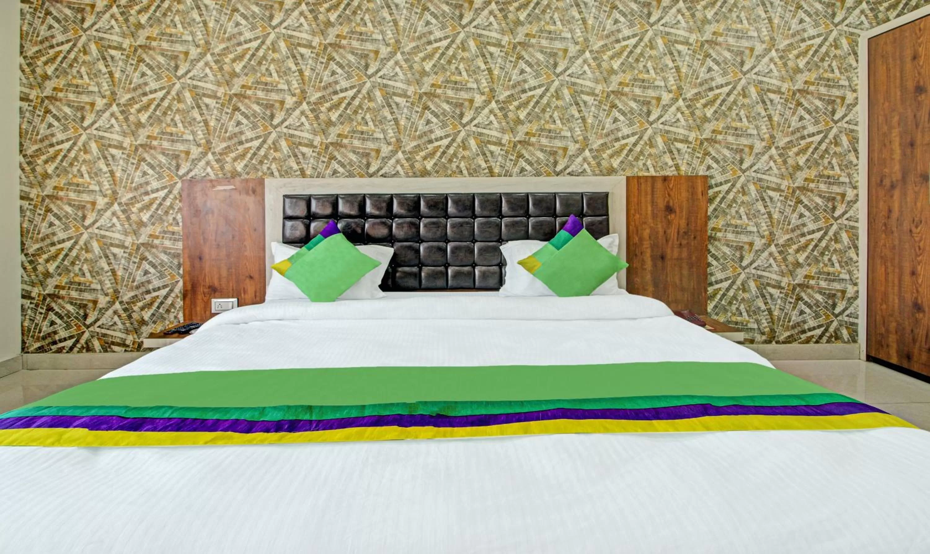 Bedroom, Bed in Treebo Golden Heights