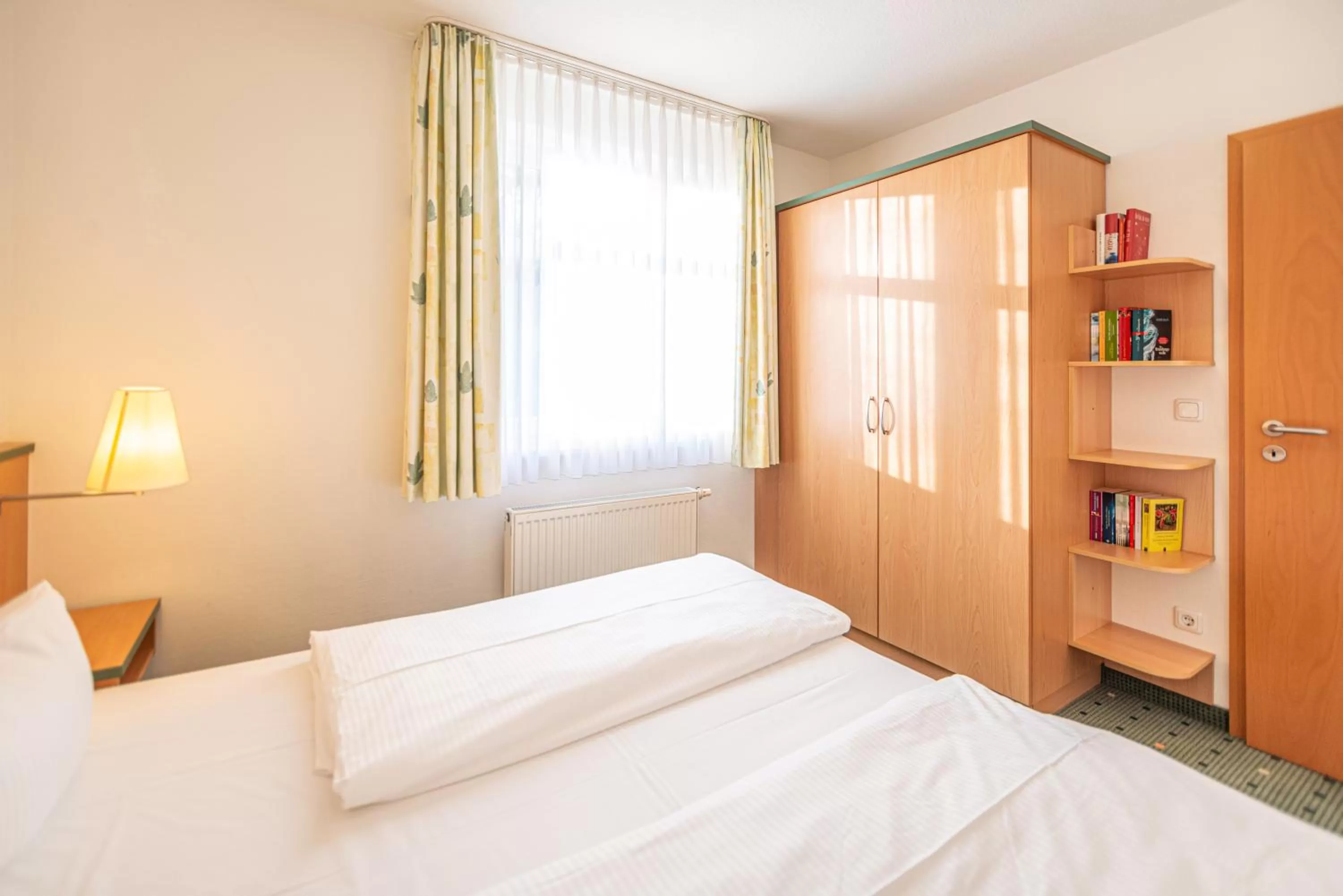 Bed in Am Weststrand Apartmenthaus Waldeck