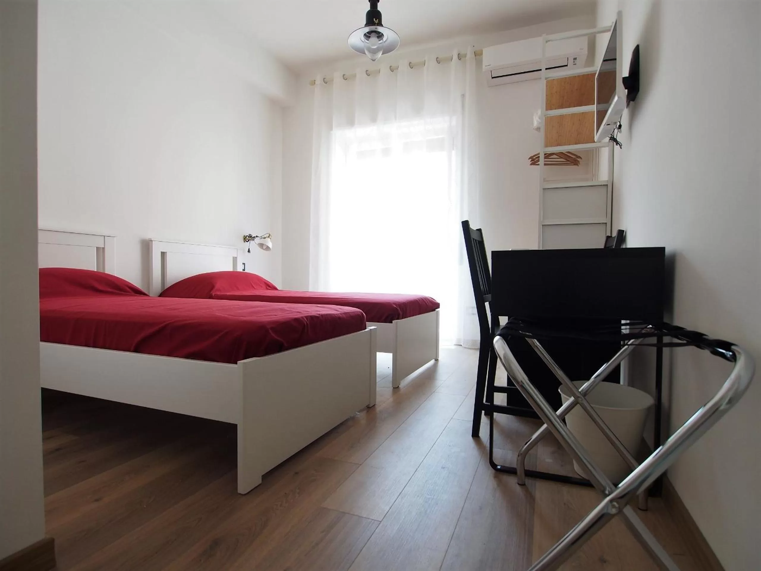 Bed in Bella Vita Rooms